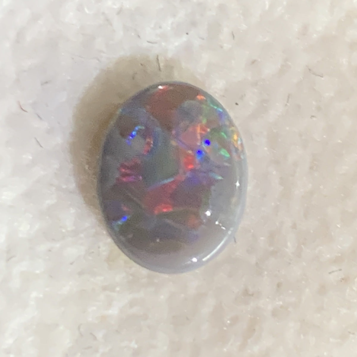 One Black Opal 0.8ct Oval shape