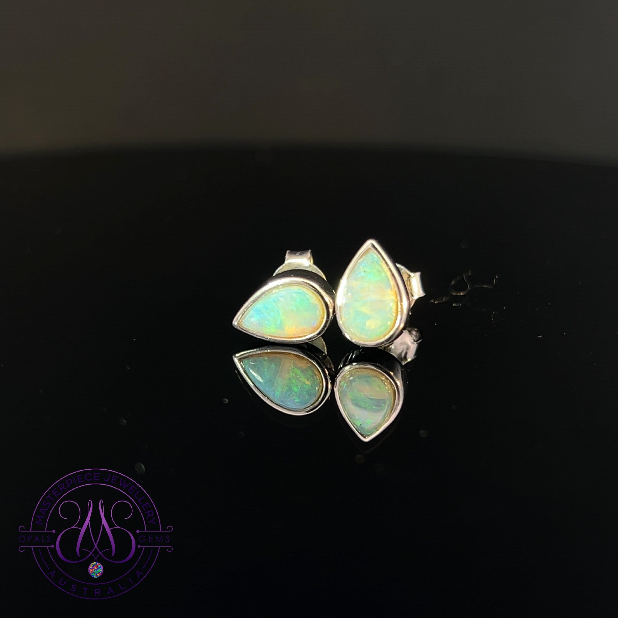 Sterling Silver pearshape 8x5mm Crystal Opal earrings bezel set