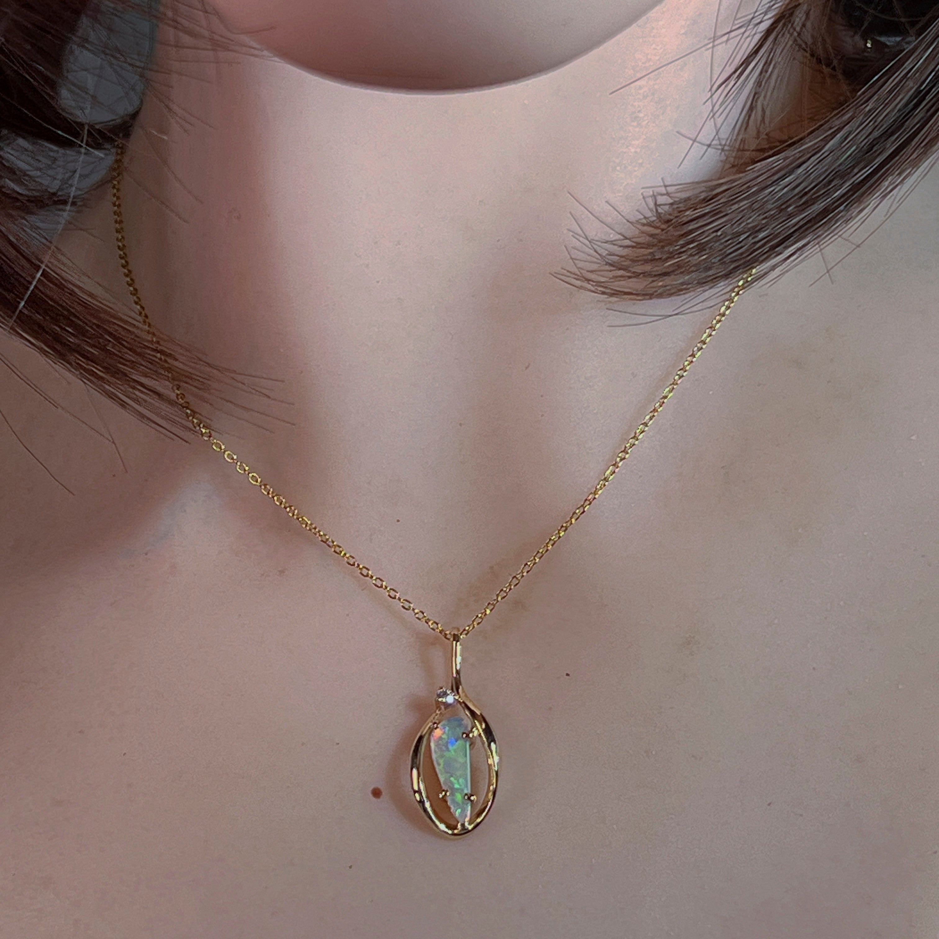 9kt yellow gold triangular crystal opal pendant and chain