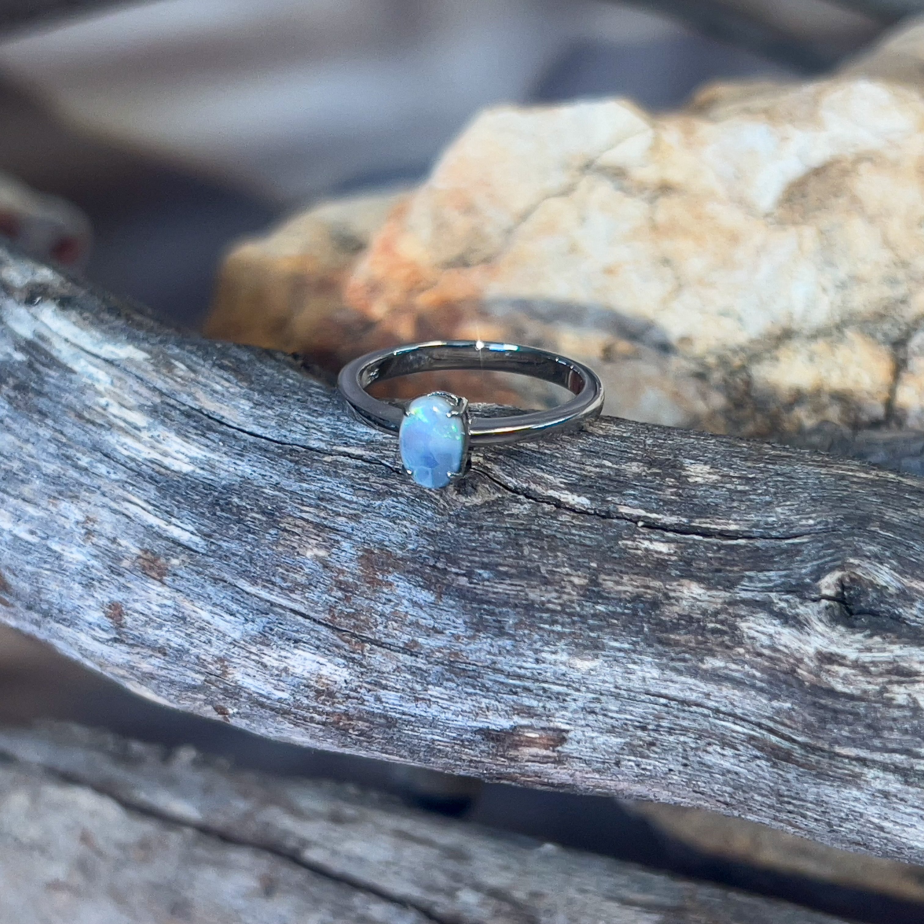 Sterling Silver Oval Black Opal 0.68ct solitaire ring - Masterpiece Jewellery Opal & Gems Sydney Australia | Online Shop