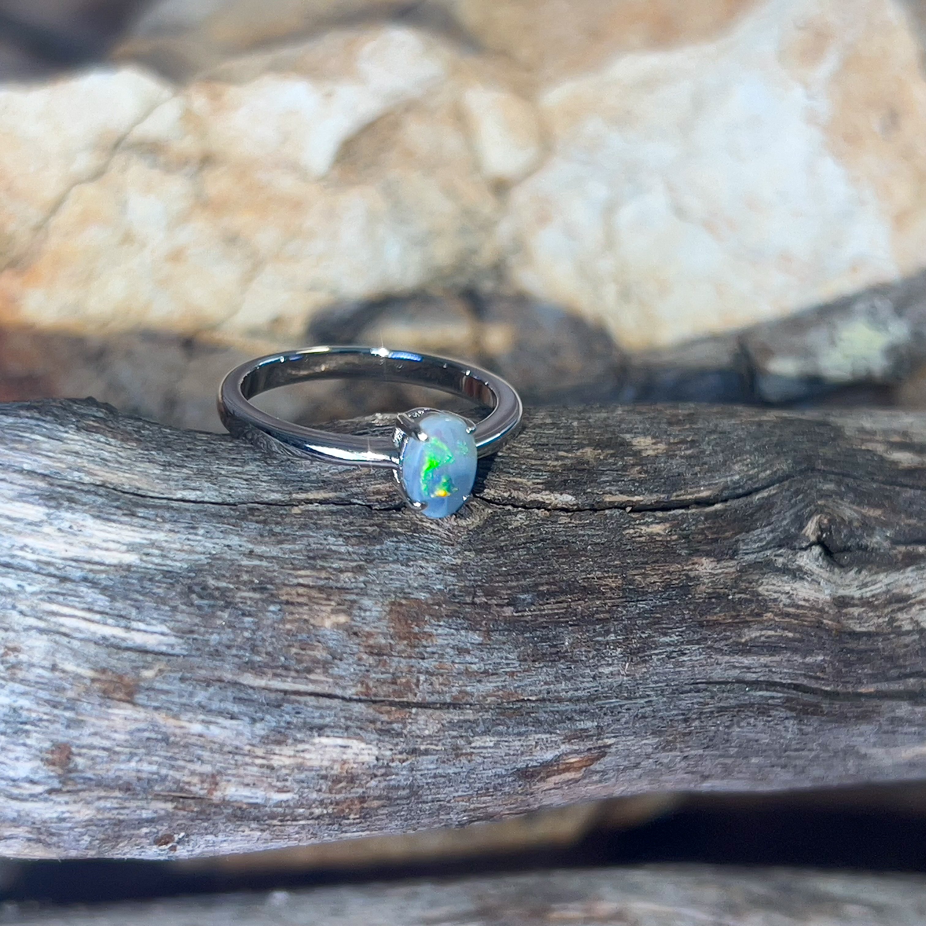 Sterling Silver Oval Black Opal 0.68ct solitaire ring - Masterpiece Jewellery Opal & Gems Sydney Australia | Online Shop