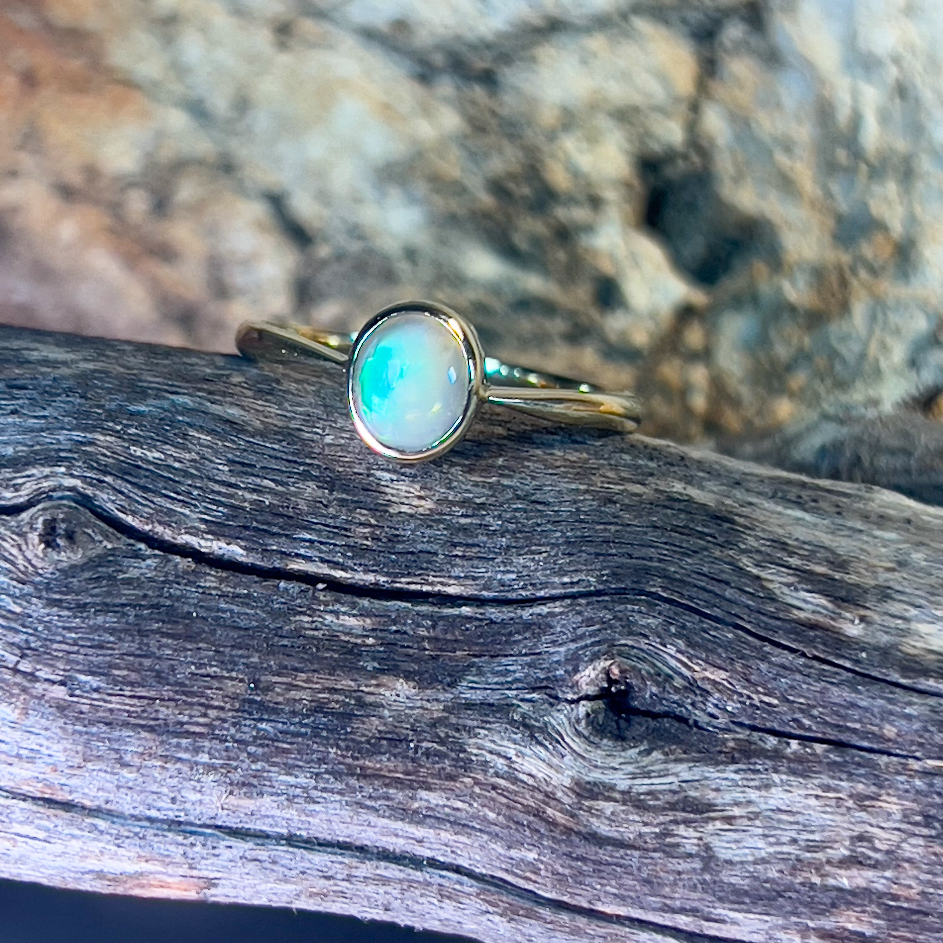 14kt Yellow Gold Black Opal 0.5ct bezel set solitaire ring - Masterpiece Jewellery Opal & Gems Sydney Australia | Online Shop