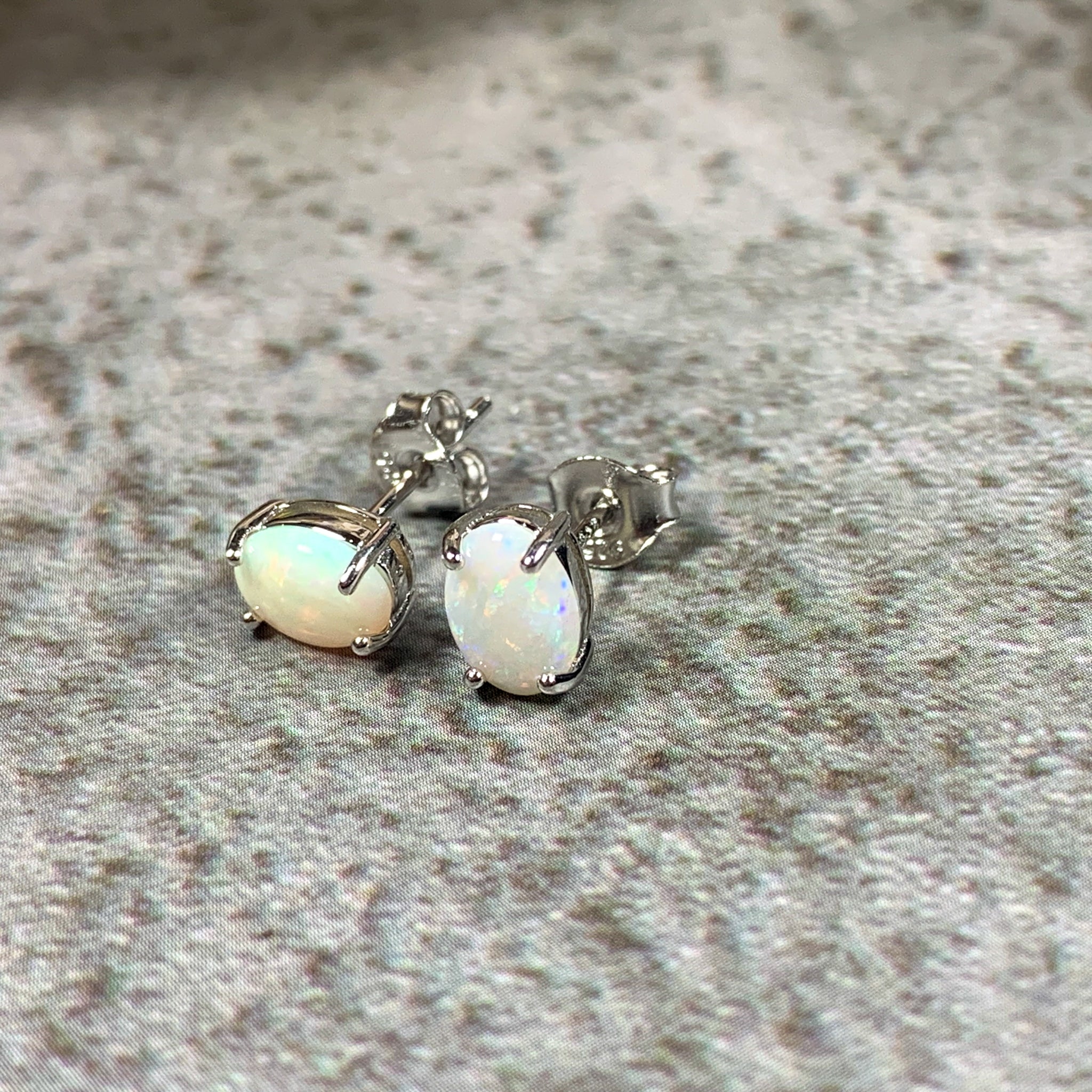 Sterling Silver 7x5mm White Opal claw studs - Masterpiece Jewellery Opal & Gems Sydney Australia | Online Shop