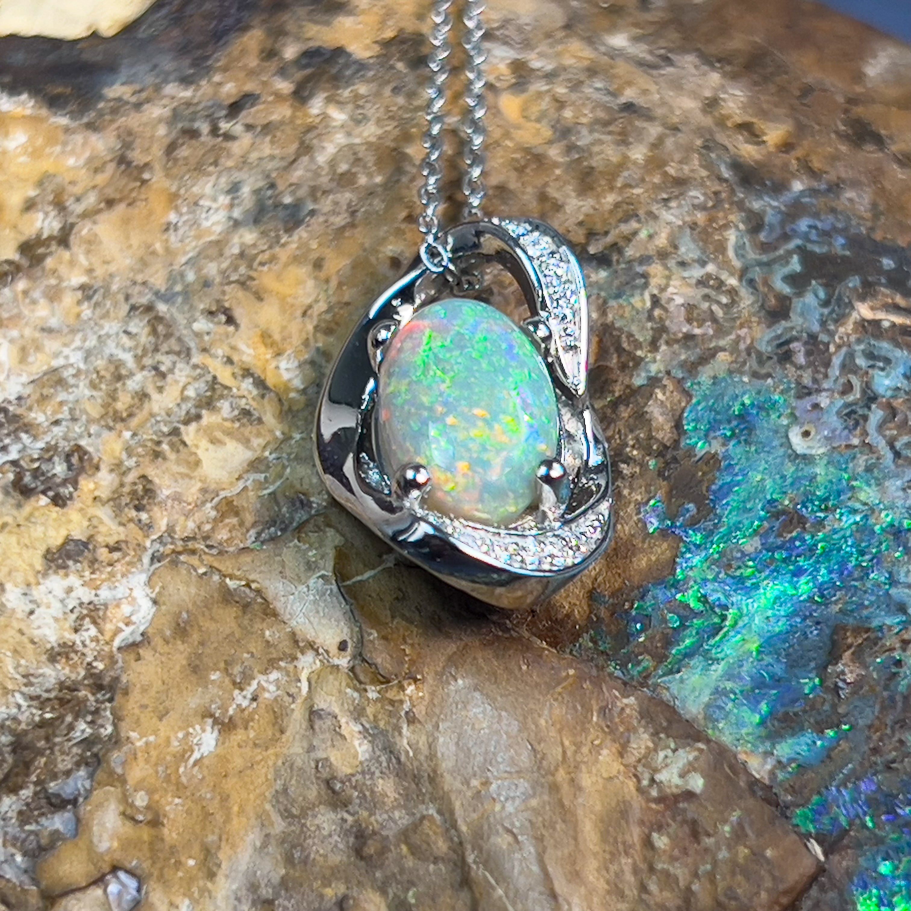 Platinum Pendant with 1.77ct Black Opal and 10 Diamonds - Masterpiece Jewellery Opal & Gems Sydney Australia | Online Shop
