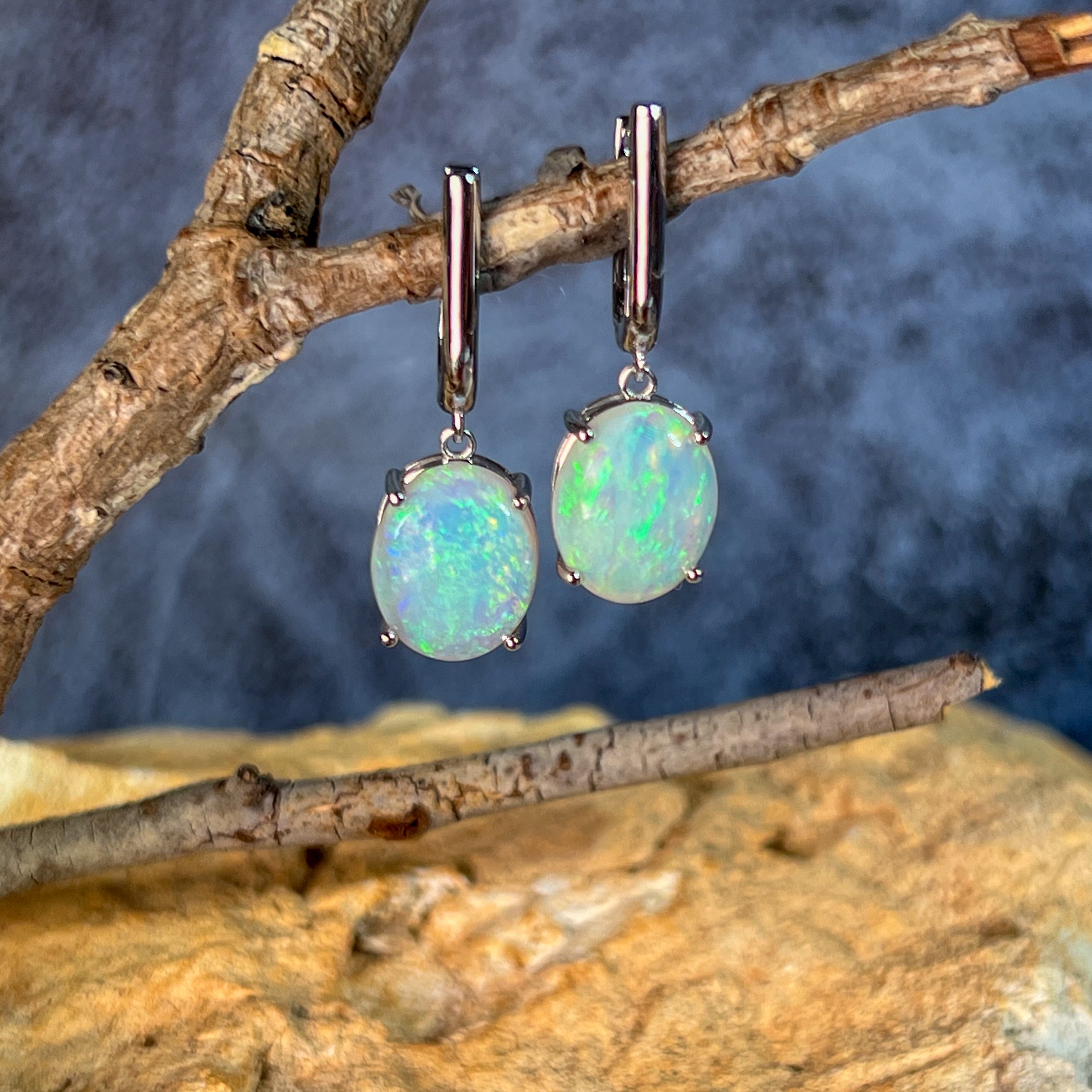 opal huggie earrings