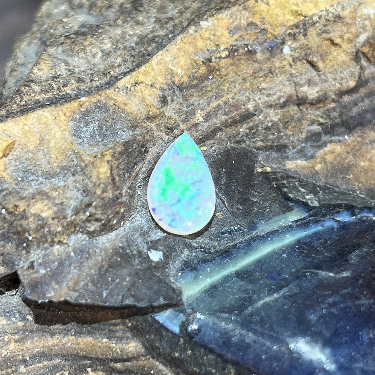 Pear 11.8x7.8mm solid Australian crystal opal, 1.15ct, green and yellow, unset stone on rock