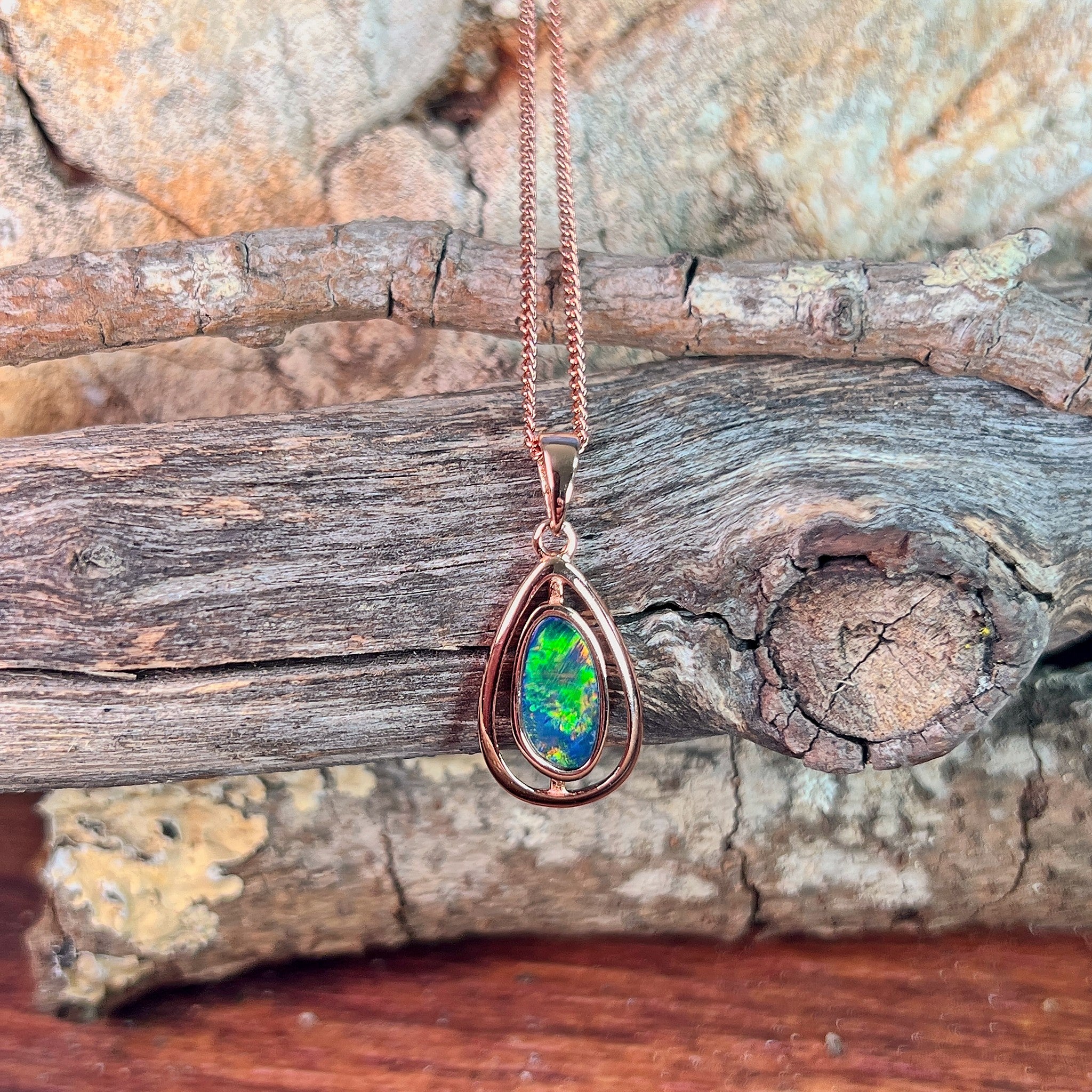 12 x 6mm Australian opal doublet pendant in rose gold-plated silver, blue, green and red