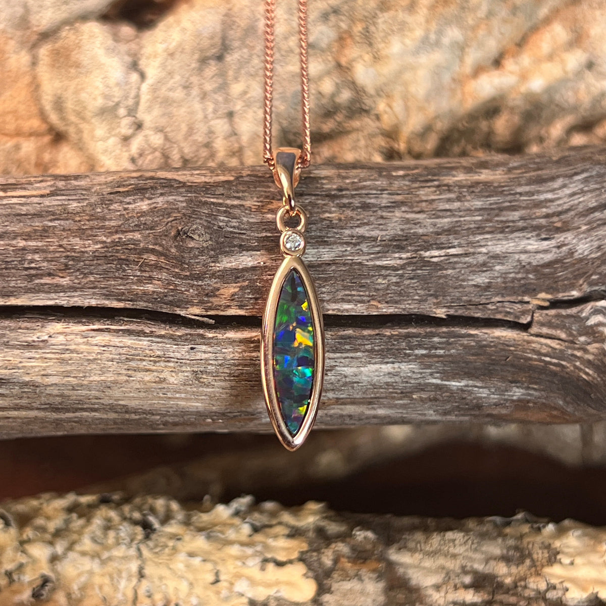 rose gold-plated silver Australian opal doublet pendant with a 15 x 5mm marquise stone