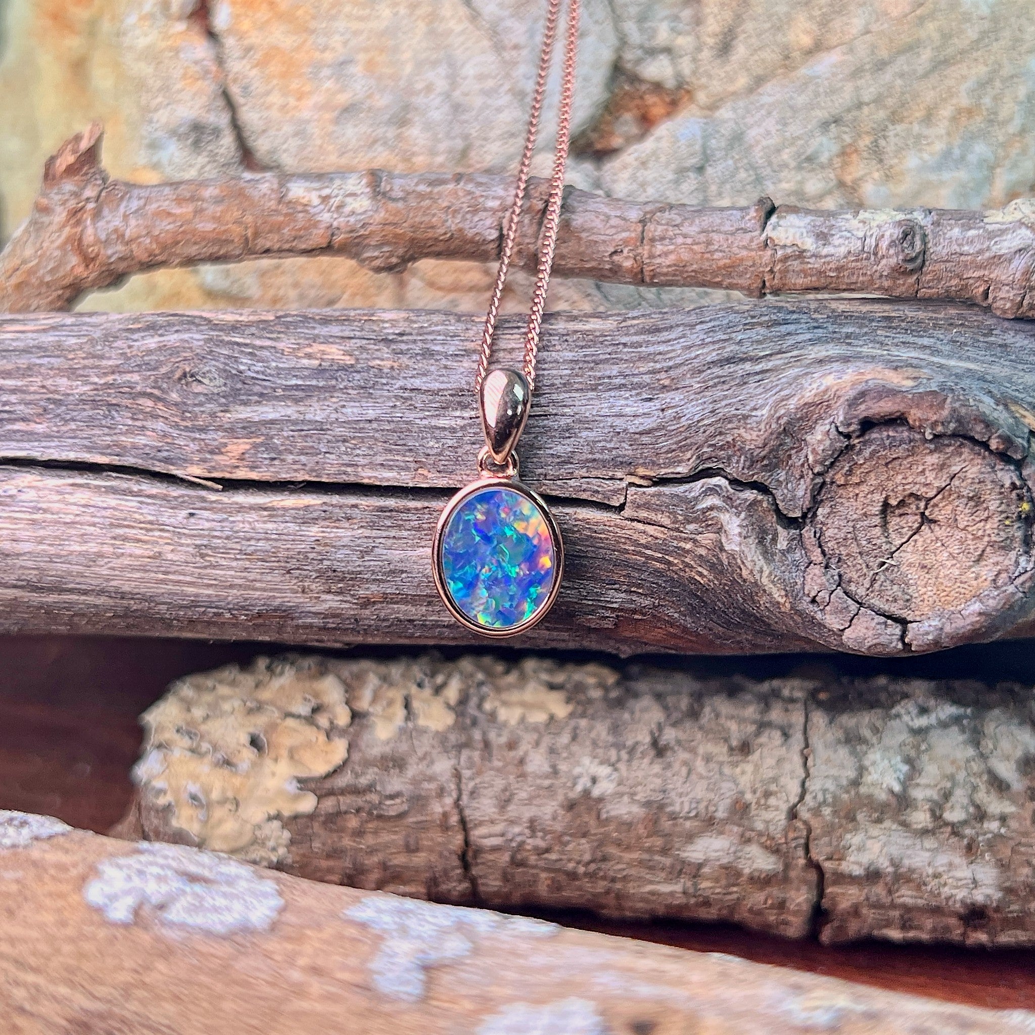 10 x 8mm Australian opal doublet pendant in rose gold-plated silver, blue, yellow, green and red