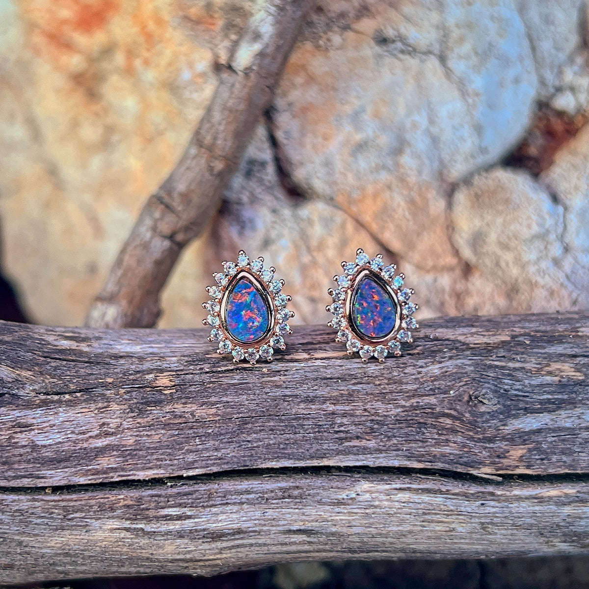 Australian opal doublet earrings, rose gold-plated silver, 7 x 5mm stones showing red, blue and green