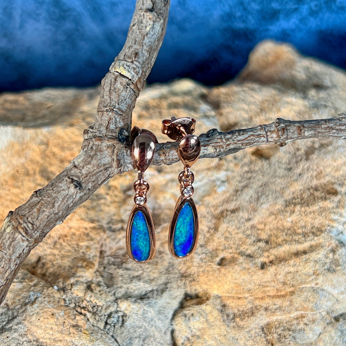 Australian opal doublet earrings, rose gold-plated silver, 15 x 5mm stones showing green and blue