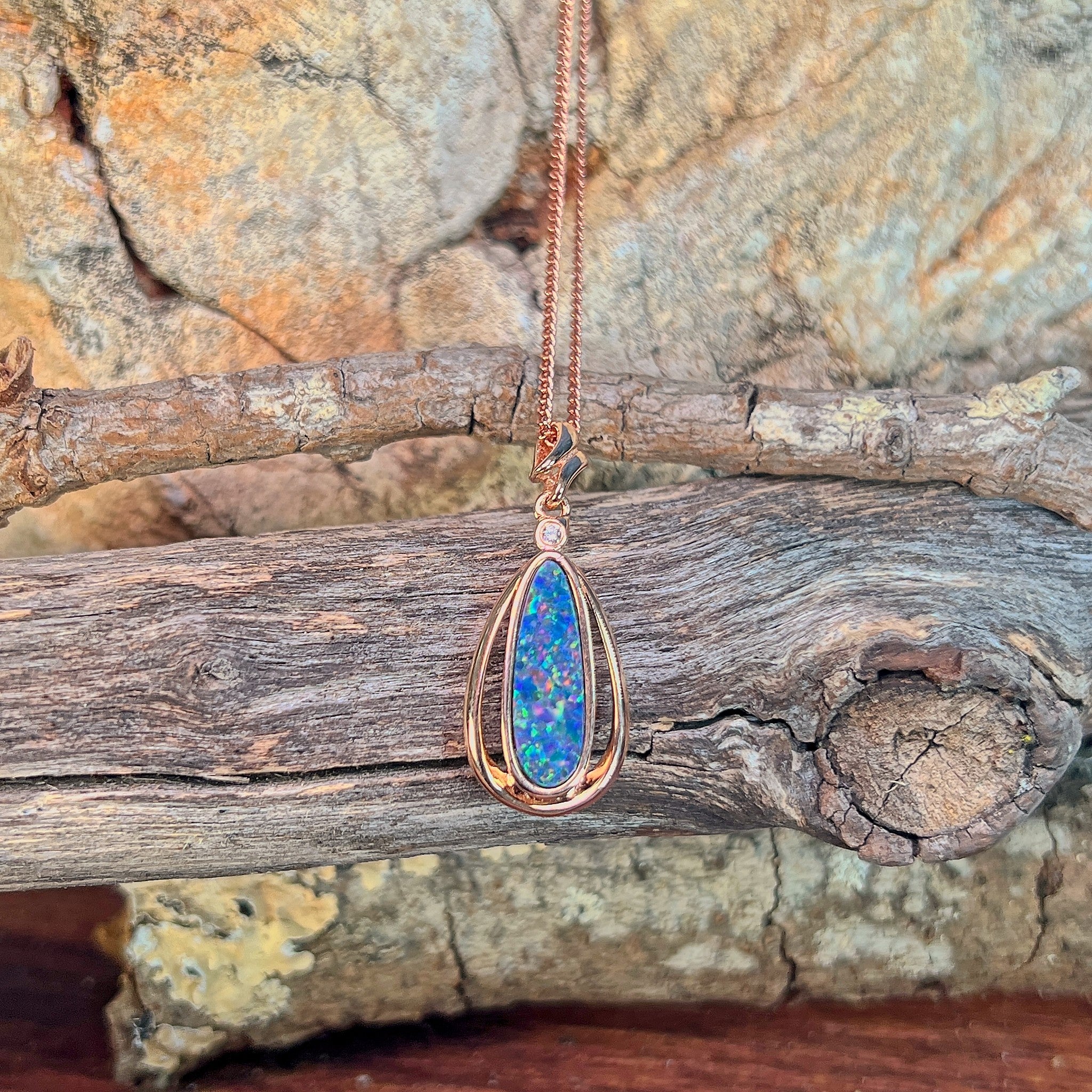 pear-shaped Australian opal doublet pendant in rose gold-plated silver, blue, yellow, green and red play-of-colour
