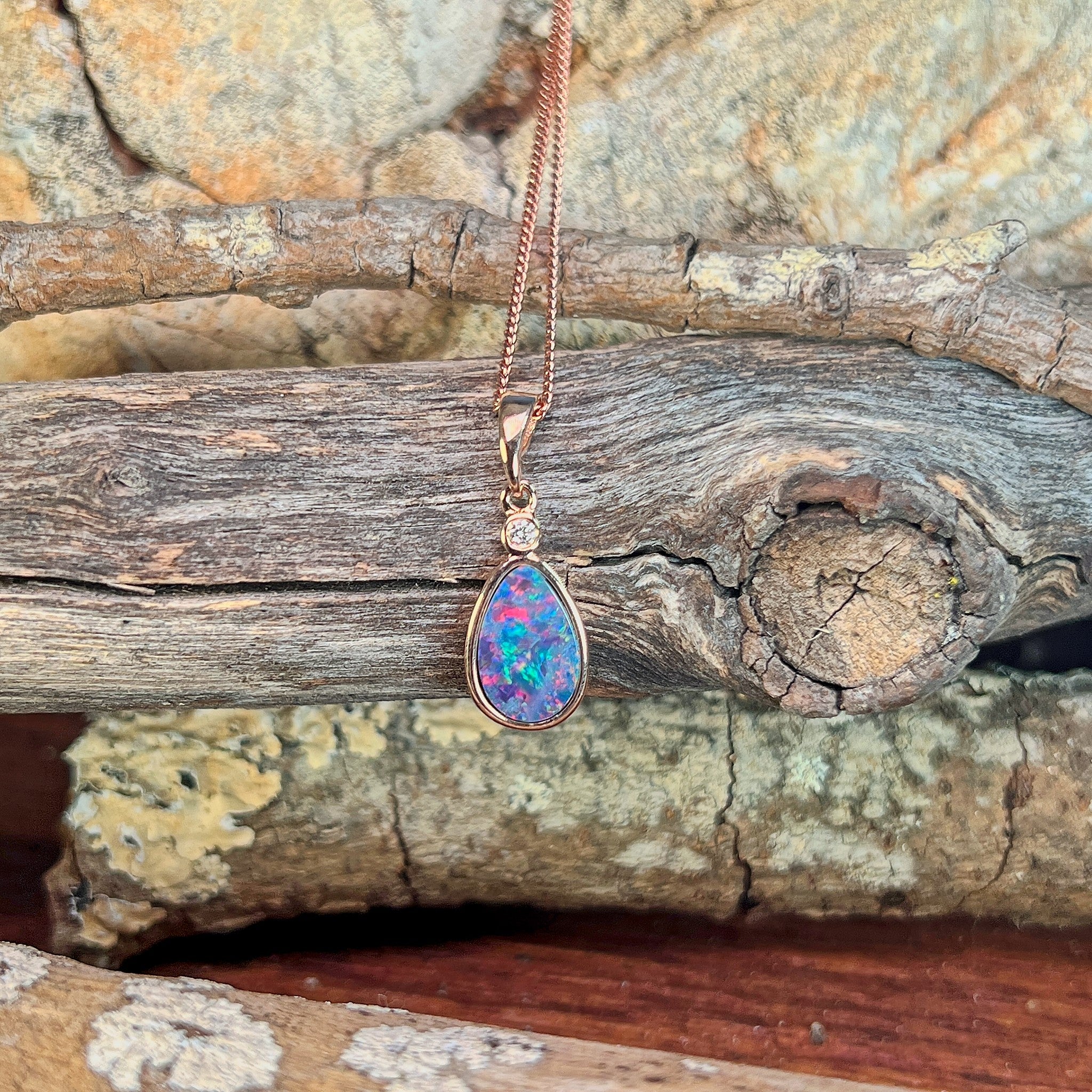 pear-shaped Australian opal doublet pendant in rose gold-plated silver, blue, red, yellow and green play-of-colour