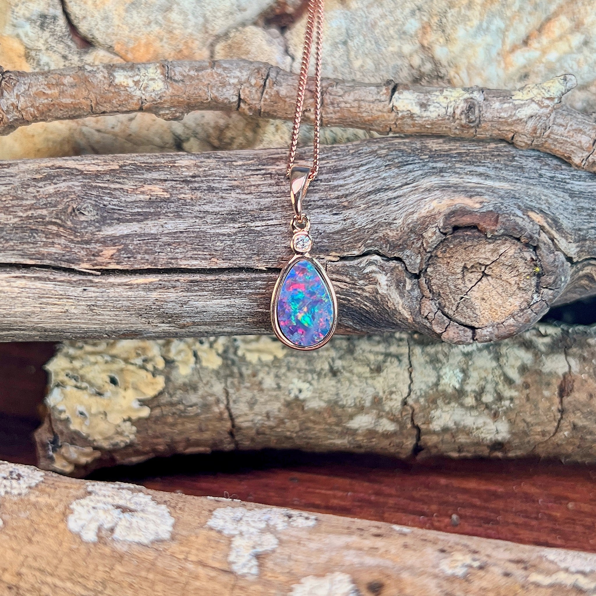 11 x 7mm Australian opal doublet pendant in rose gold-plated silver, blue, red, yellow and green