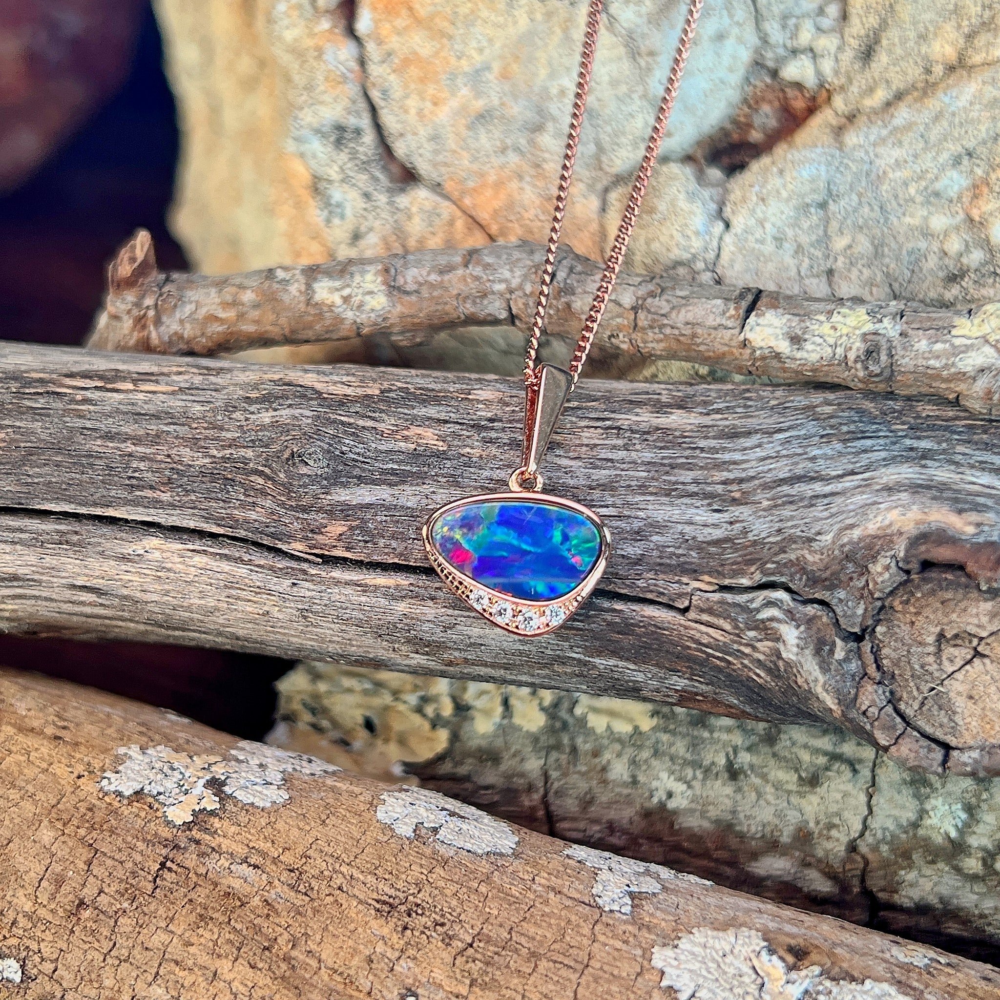 13 x 7mm Australian opal doublet pendant in rose gold-plated silver, blue, yellow, green and red