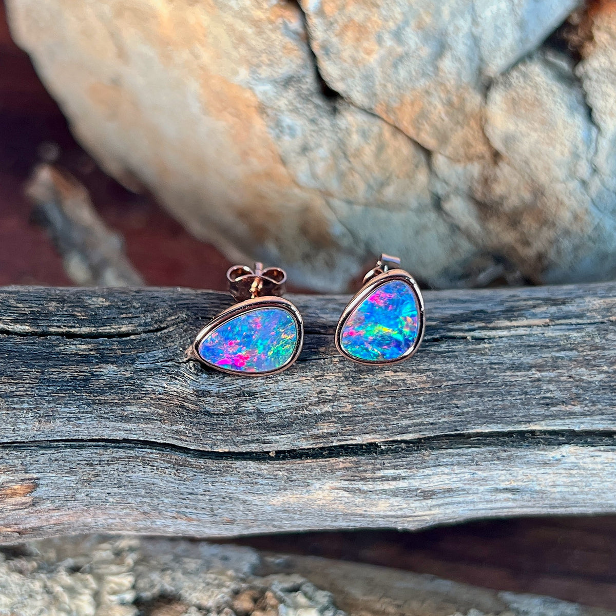 10 x 8mm Australian opal doublet earrings in rose gold-plated silver, red, blue and green