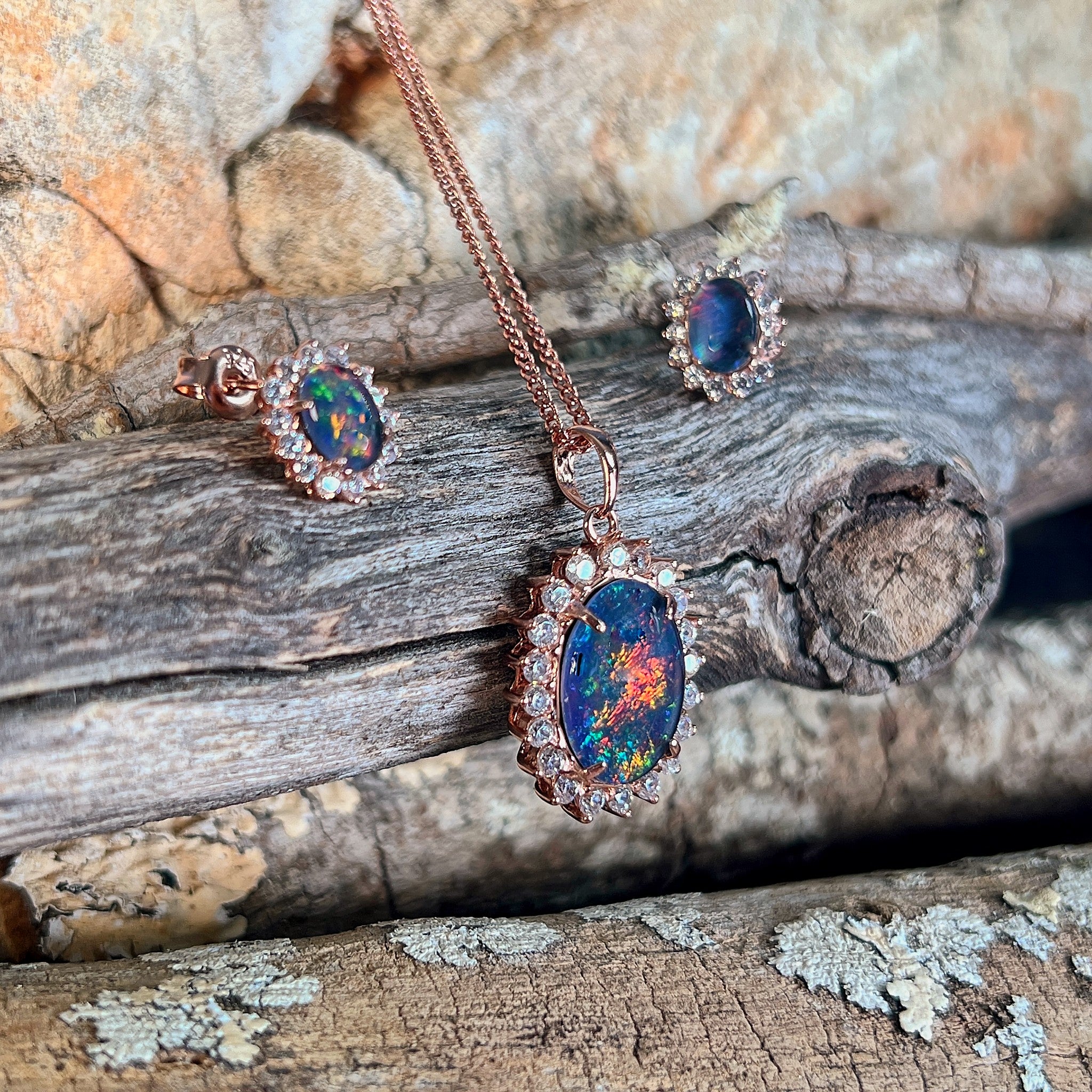 rose gold-plated silver Australian opal triplet pendant and earring set with a 14 x 10mm oval stone