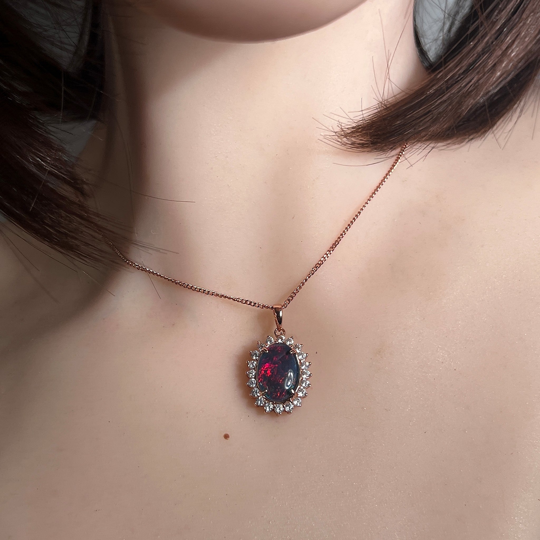 Worn Australian opal triplet pendant and earring set in rose gold-plated silver, red, blue and green, 14 x 10mm