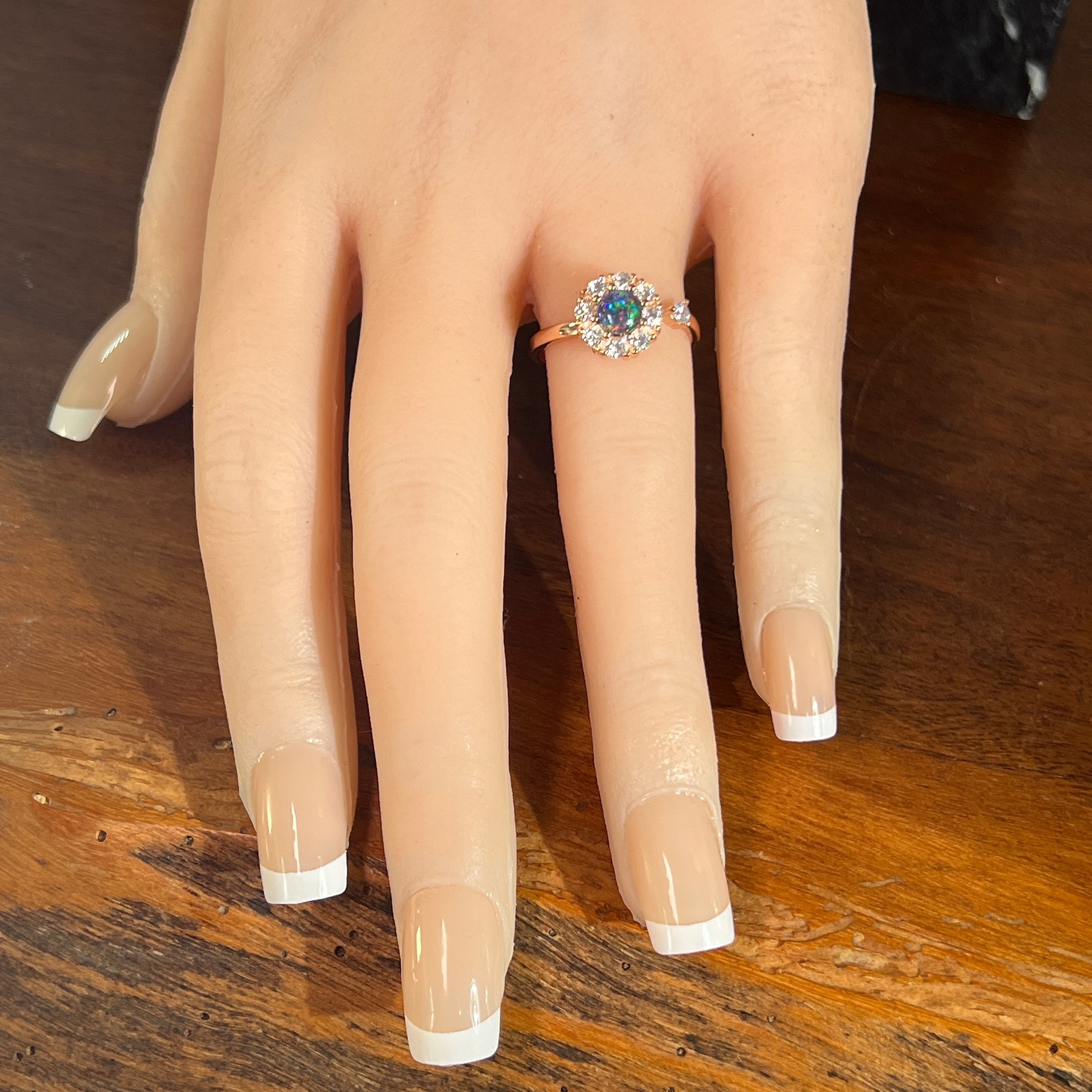 Worn Australian opal triplet ring in rose gold-plated silver, red, blue and green, 5mm