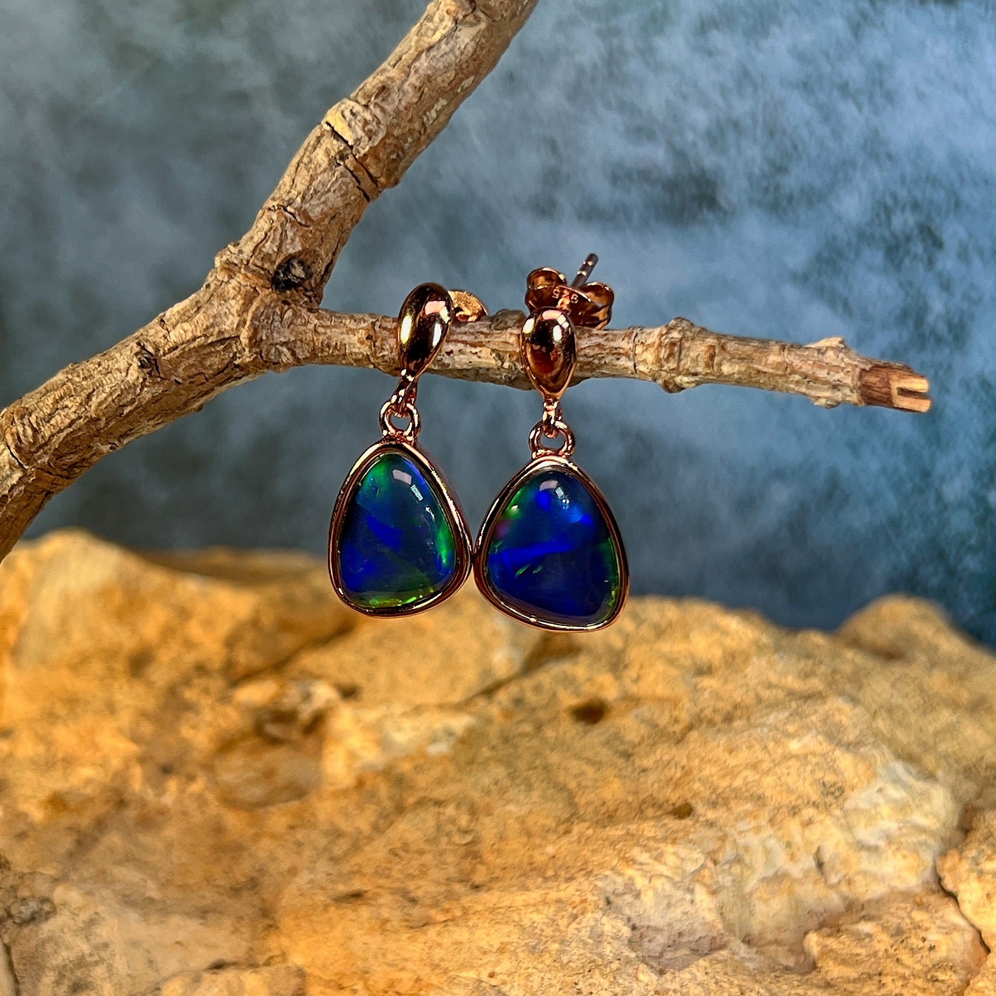 blue and green play-of-colour in 12.5 x 10.5mm triangular Australian opal triplet earrings