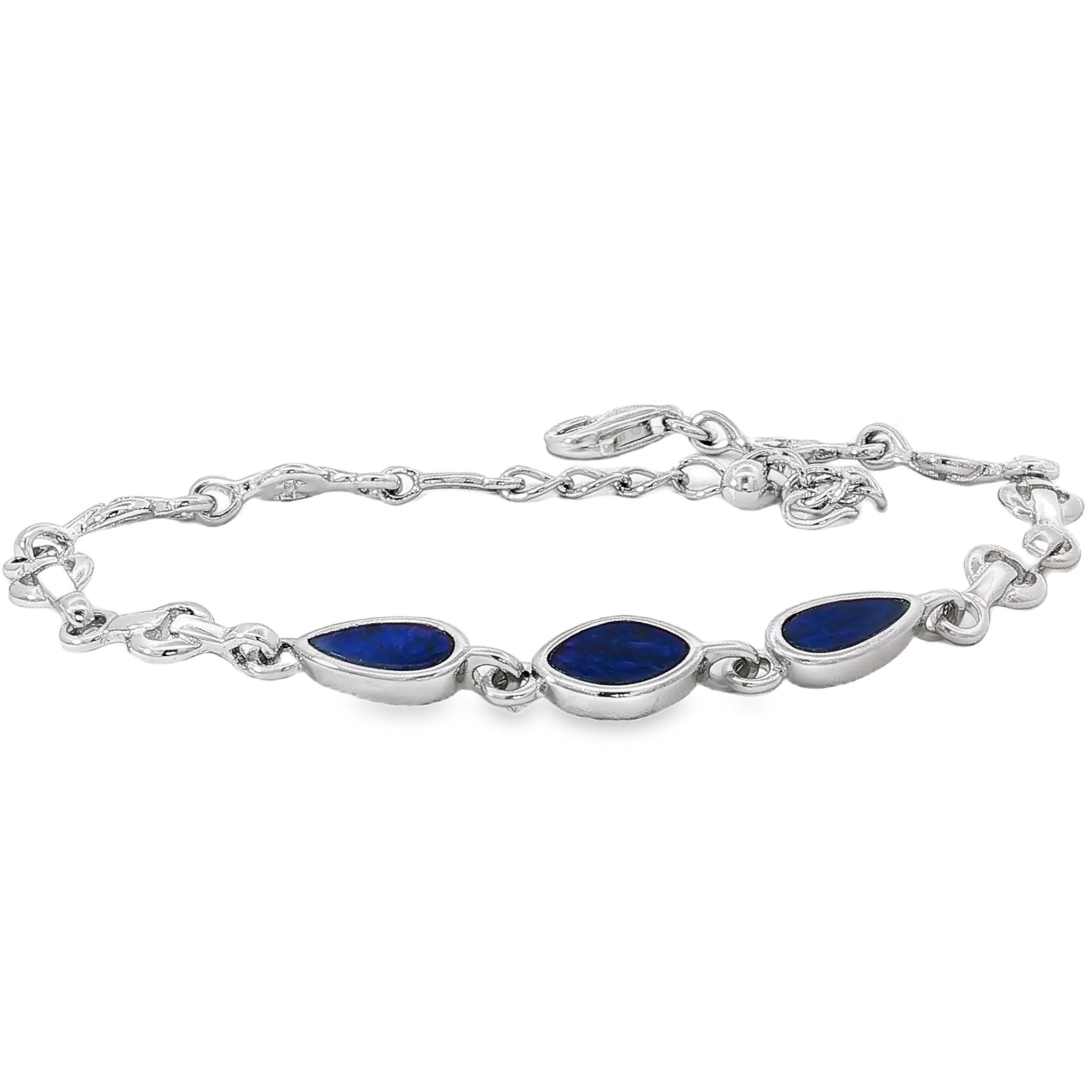 Sterling silver bracelet set with three freeform opal doublets on an adjustable chain, in blue and black