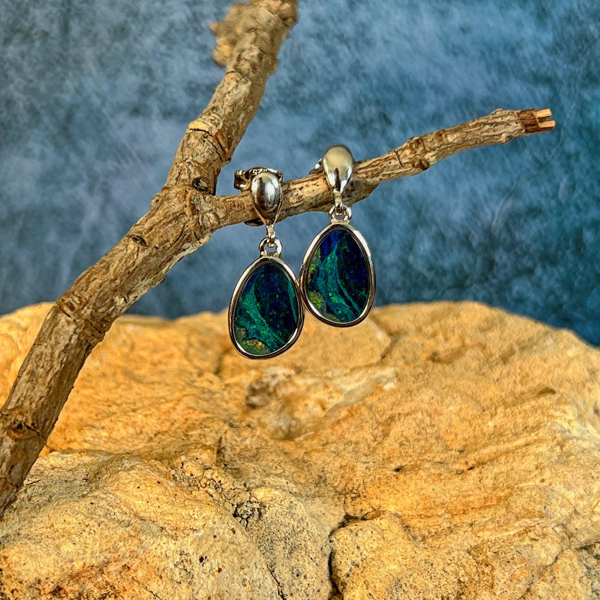 Australian opal doublet earrings, sterling silver, 12 x 8.5mm stones showing blue, green and pink