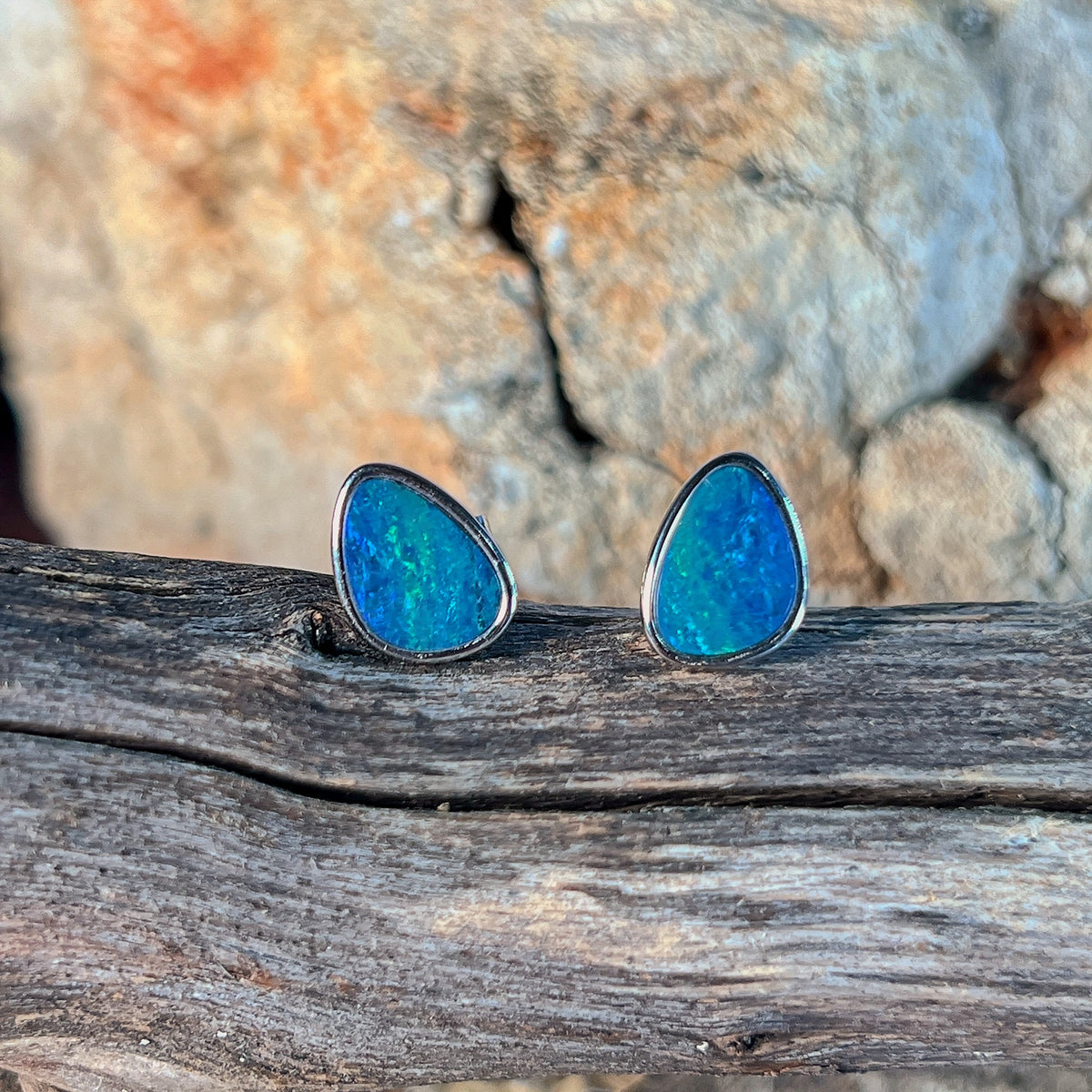 triangular Australian opal doublet earrings in sterling silver, blue and green play-of-colour