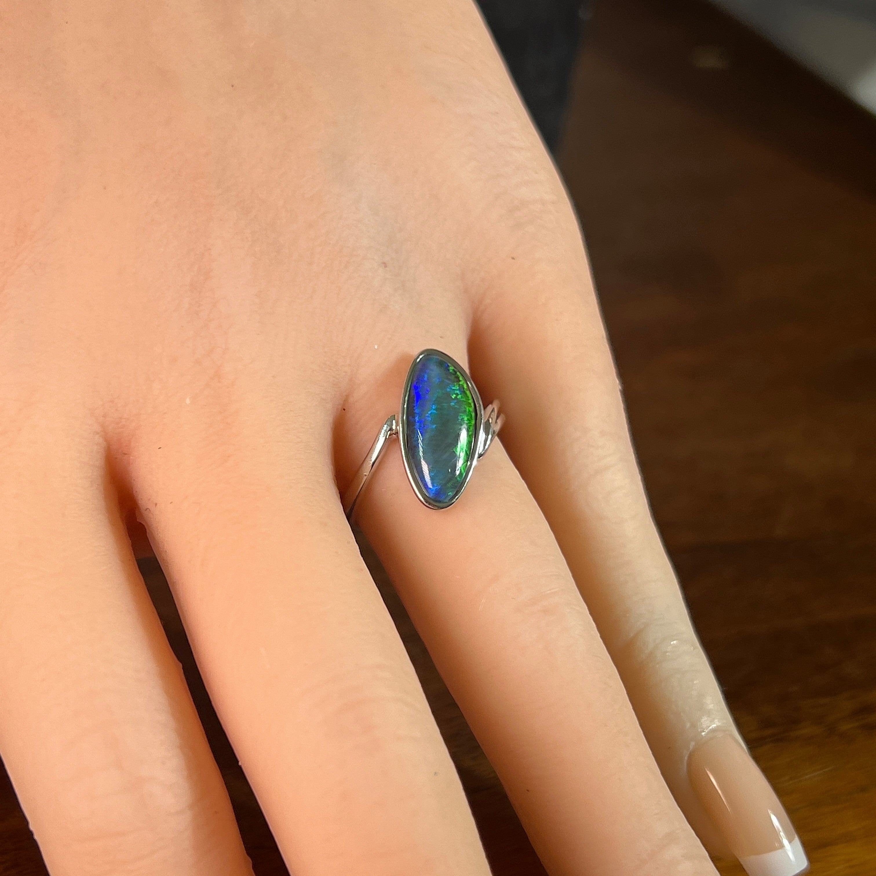 16 x 7mm freeform Australian opal triplet ring on the hand, sterling silver