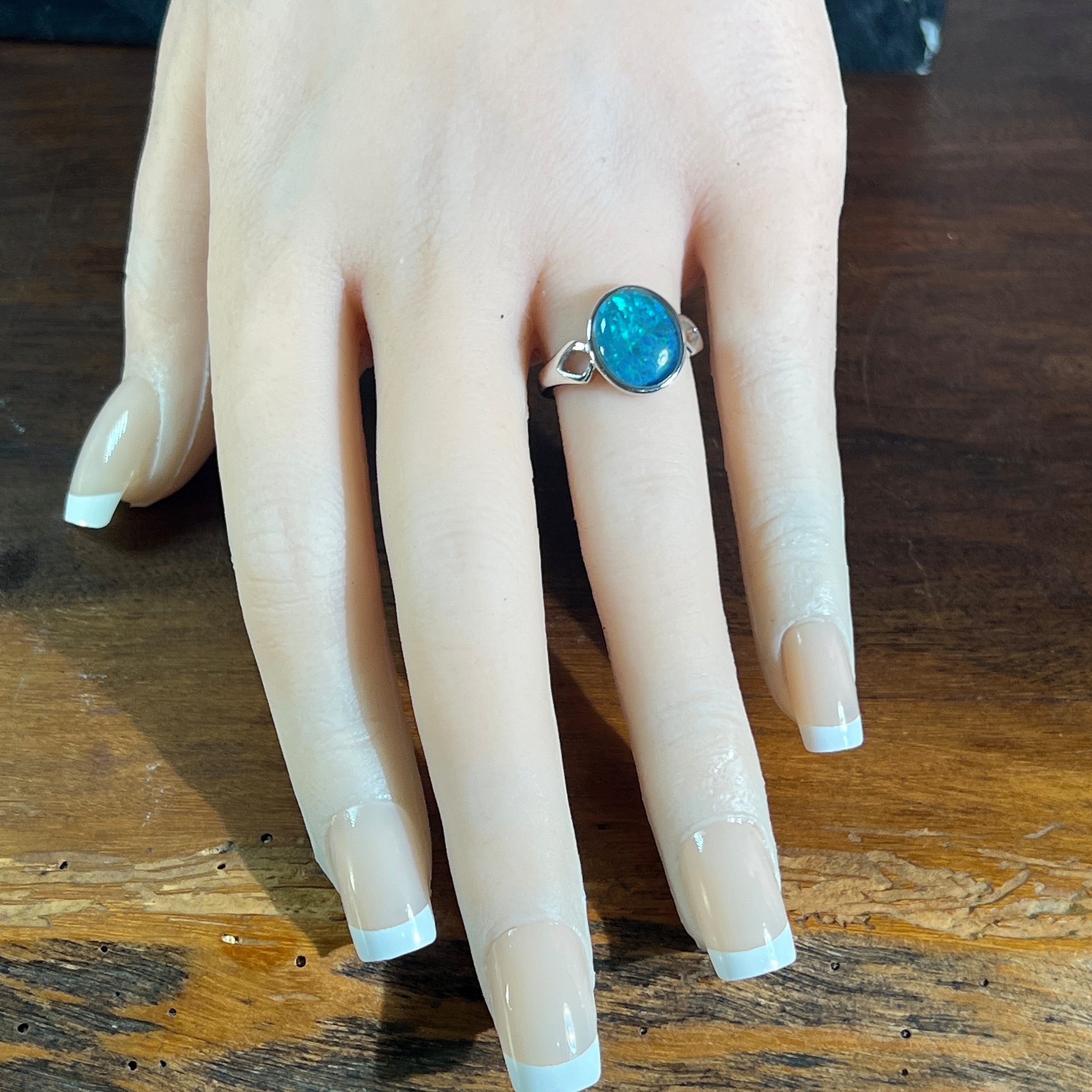 oval Australian opal triplet ring worn, sterling silver, blue and green