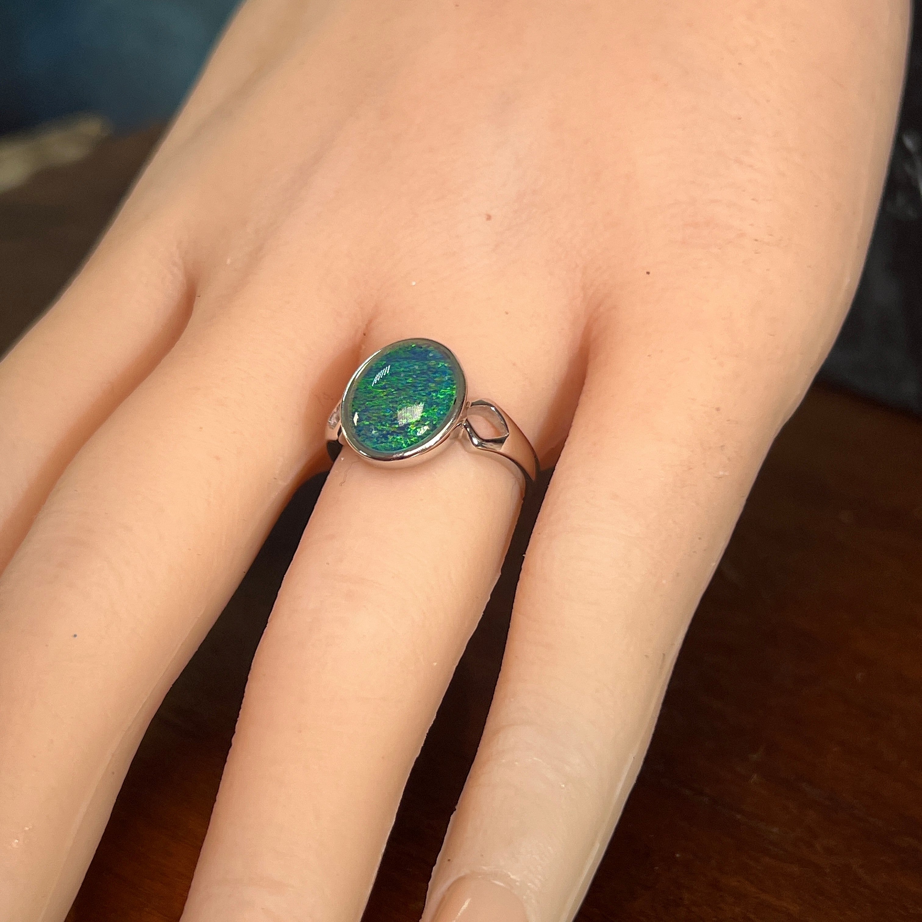 Australian opal triplet ring worn, 12 x 10mm oval stone in sterling silver