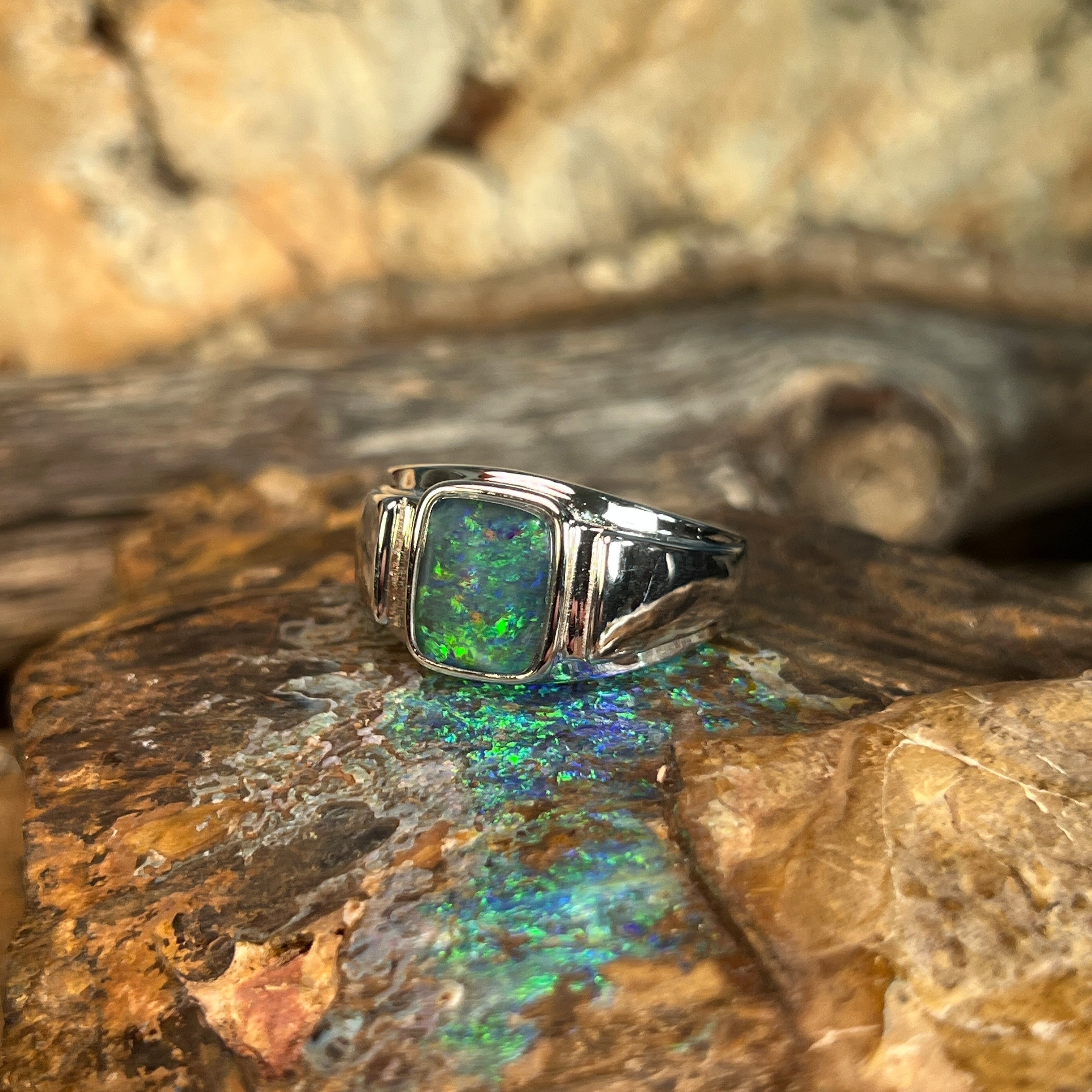 rectangular Australian opal triplet ring in sterling silver, yellow, blue and green play-of-colour