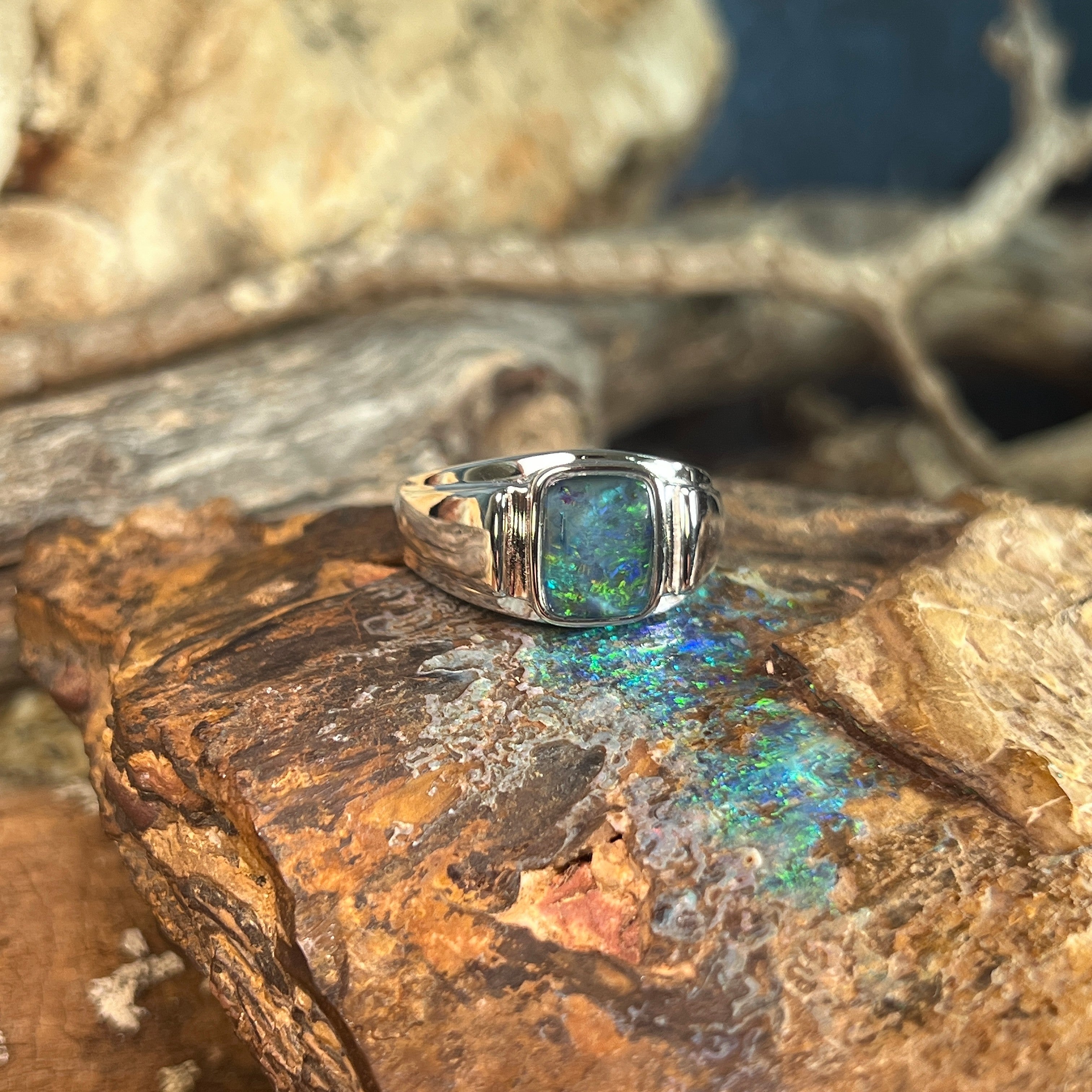 yellow, blue and green play-of-colour in a 10 x 8mm rectangular Australian opal triplet ring