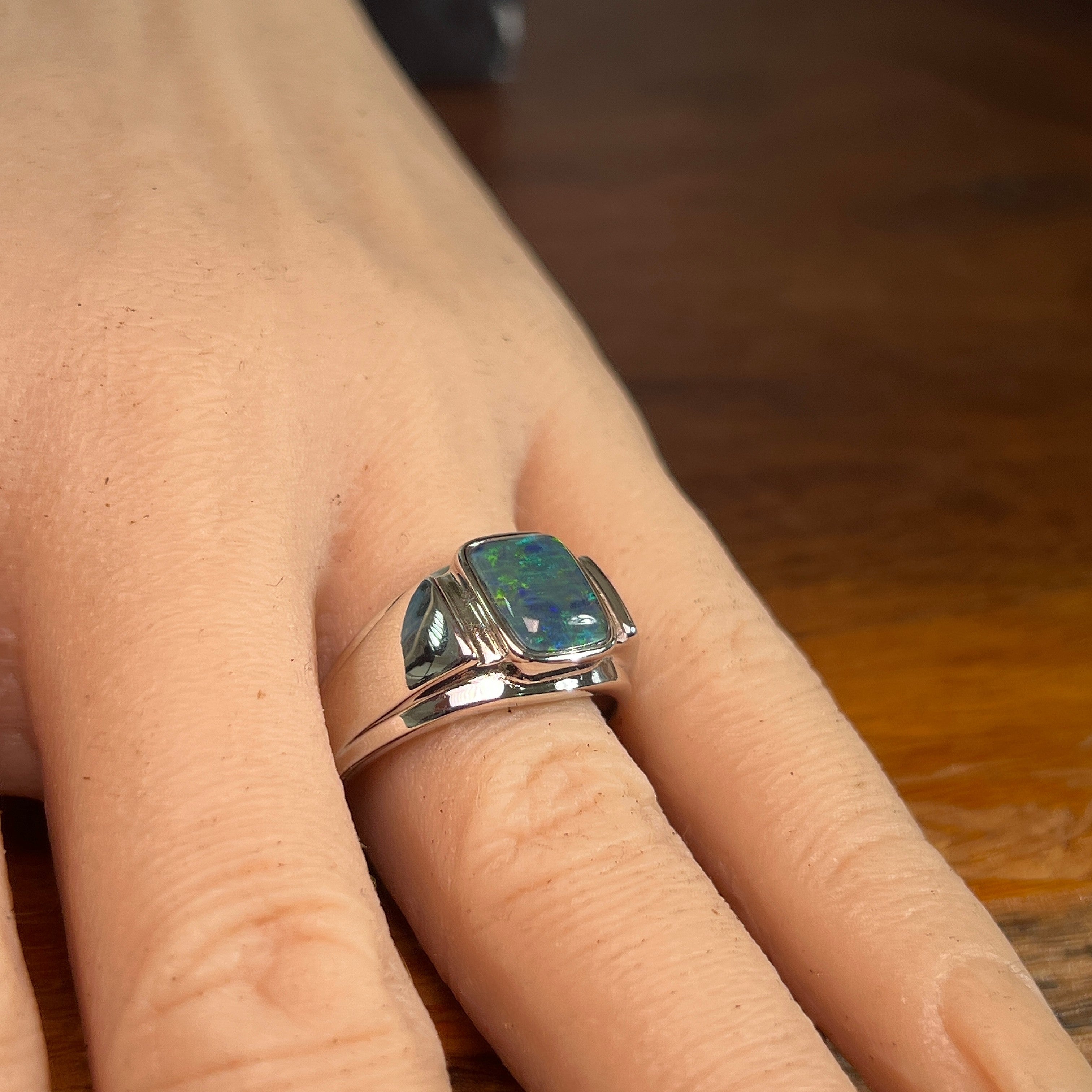 Worn Australian opal triplet ring in sterling silver, yellow, blue and green, 10 x 8mm