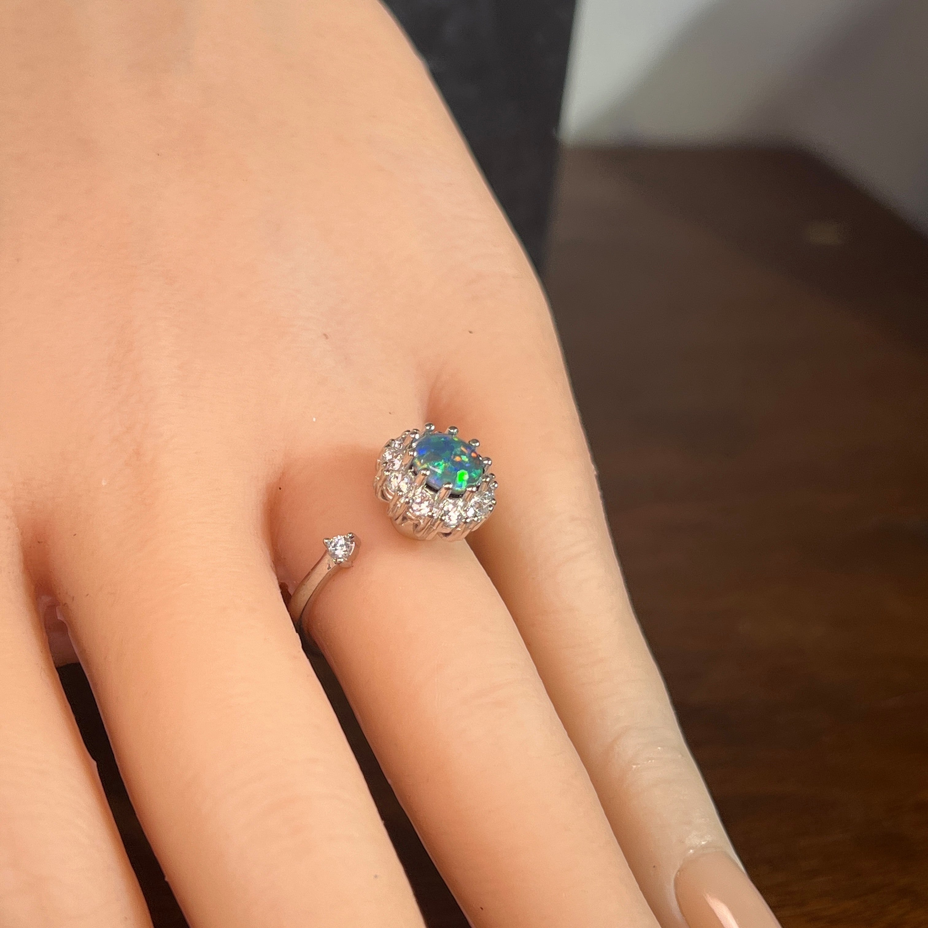 Australian opal triplet ring in sterling silver worn, round stone, size US 6.5