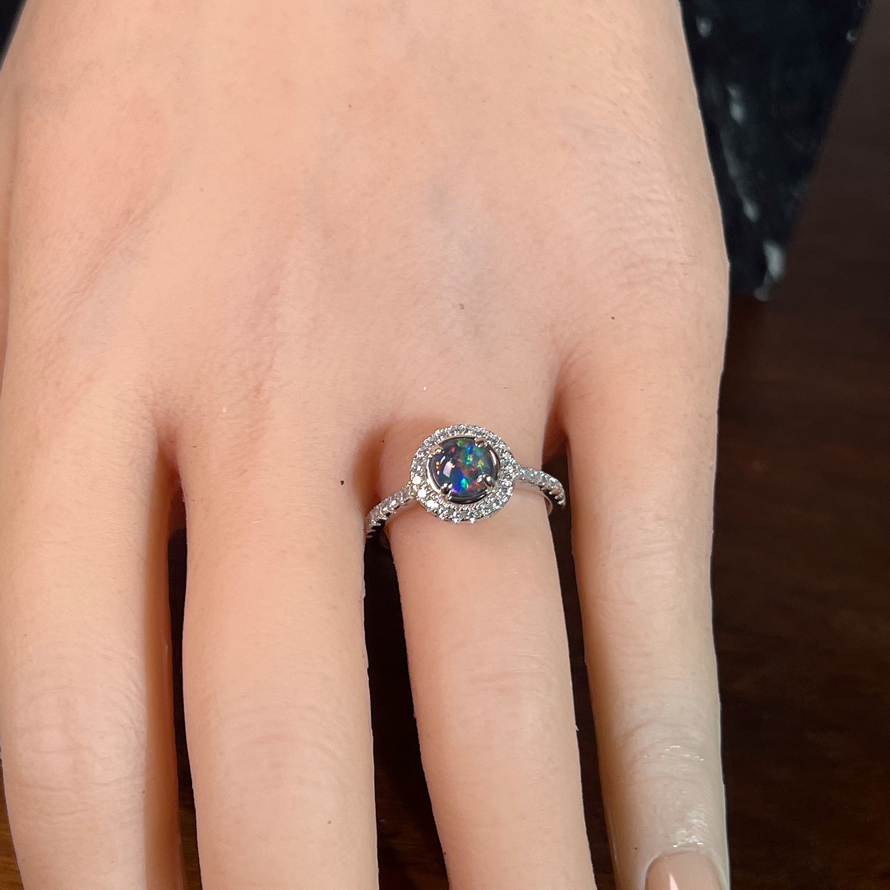 round Australian opal triplet ring in sterling silver, worn on the hand