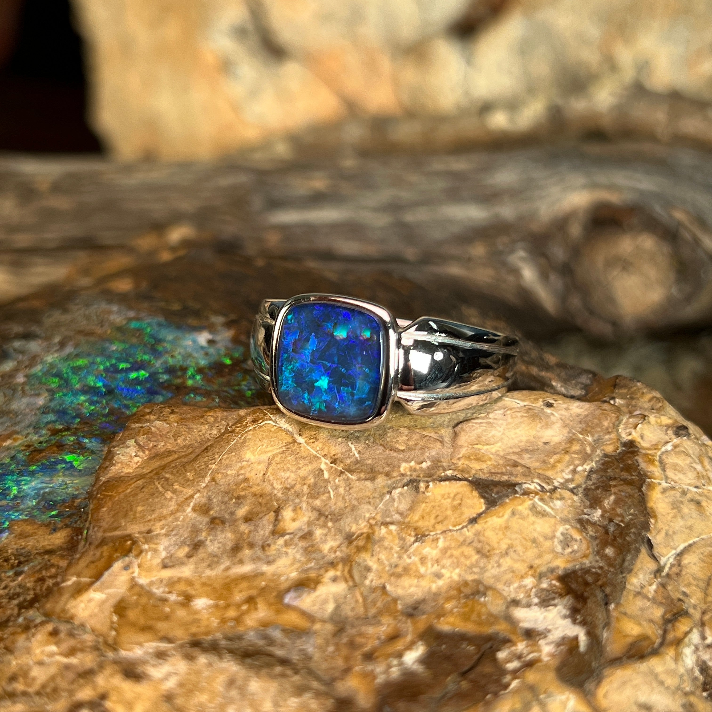 blue play-of-colour in a 10 x 10mm square Australian opal triplet ring
