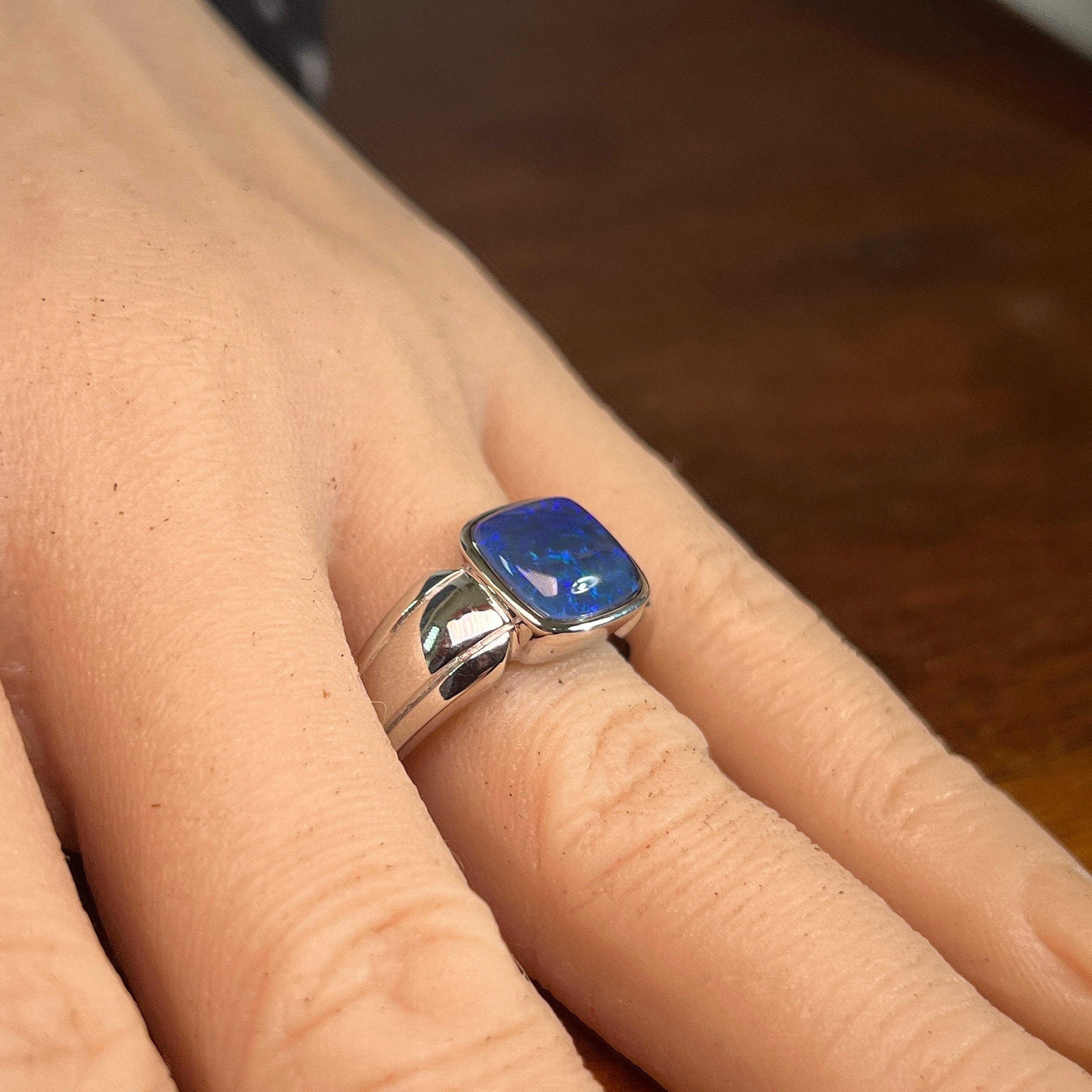 10 x 10mm square Australian opal triplet ring on the hand, sterling silver