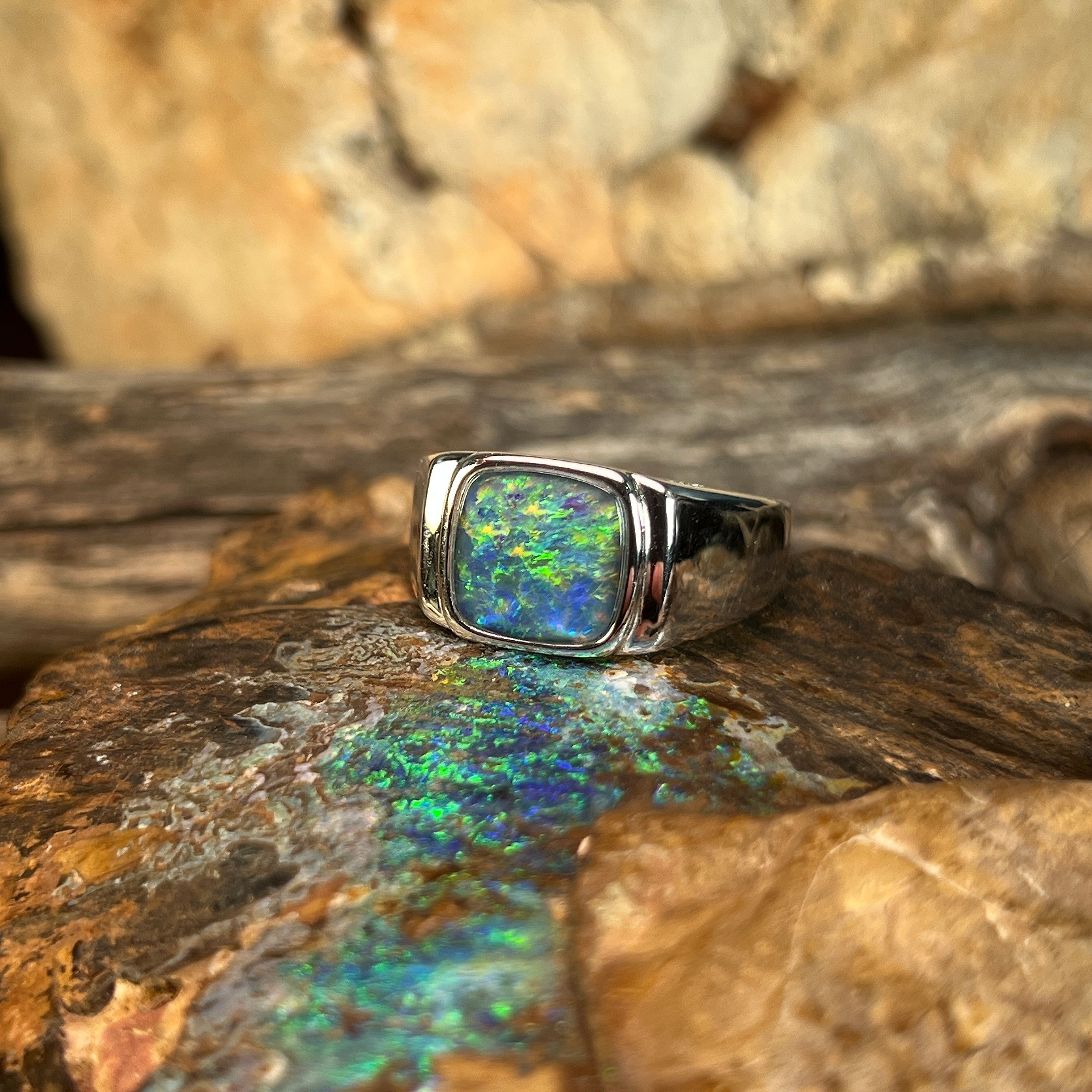 square Australian opal triplet ring in sterling silver, yellow, orange, blue and green play-of-colour