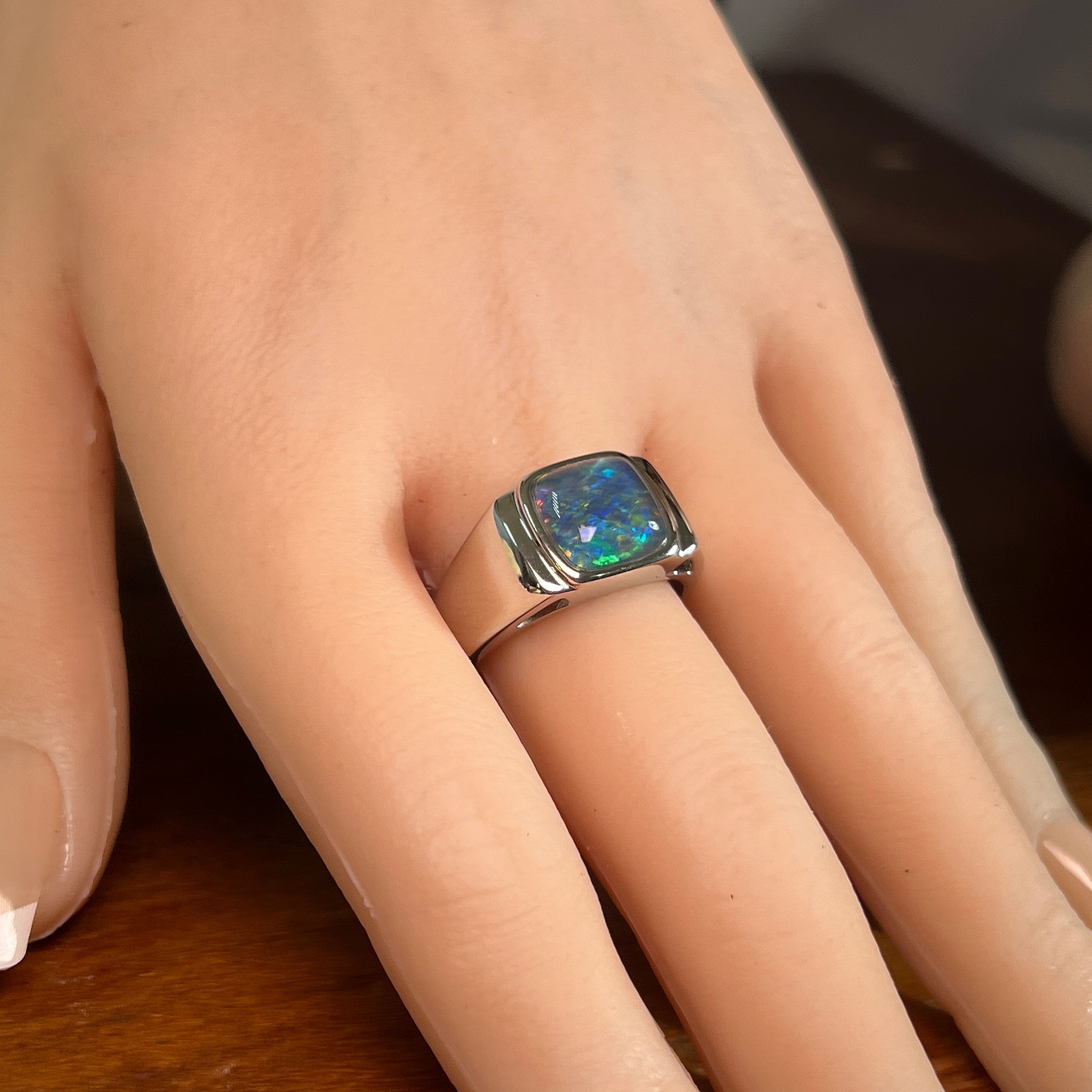 10mm square Australian opal triplet ring on the hand, sterling silver