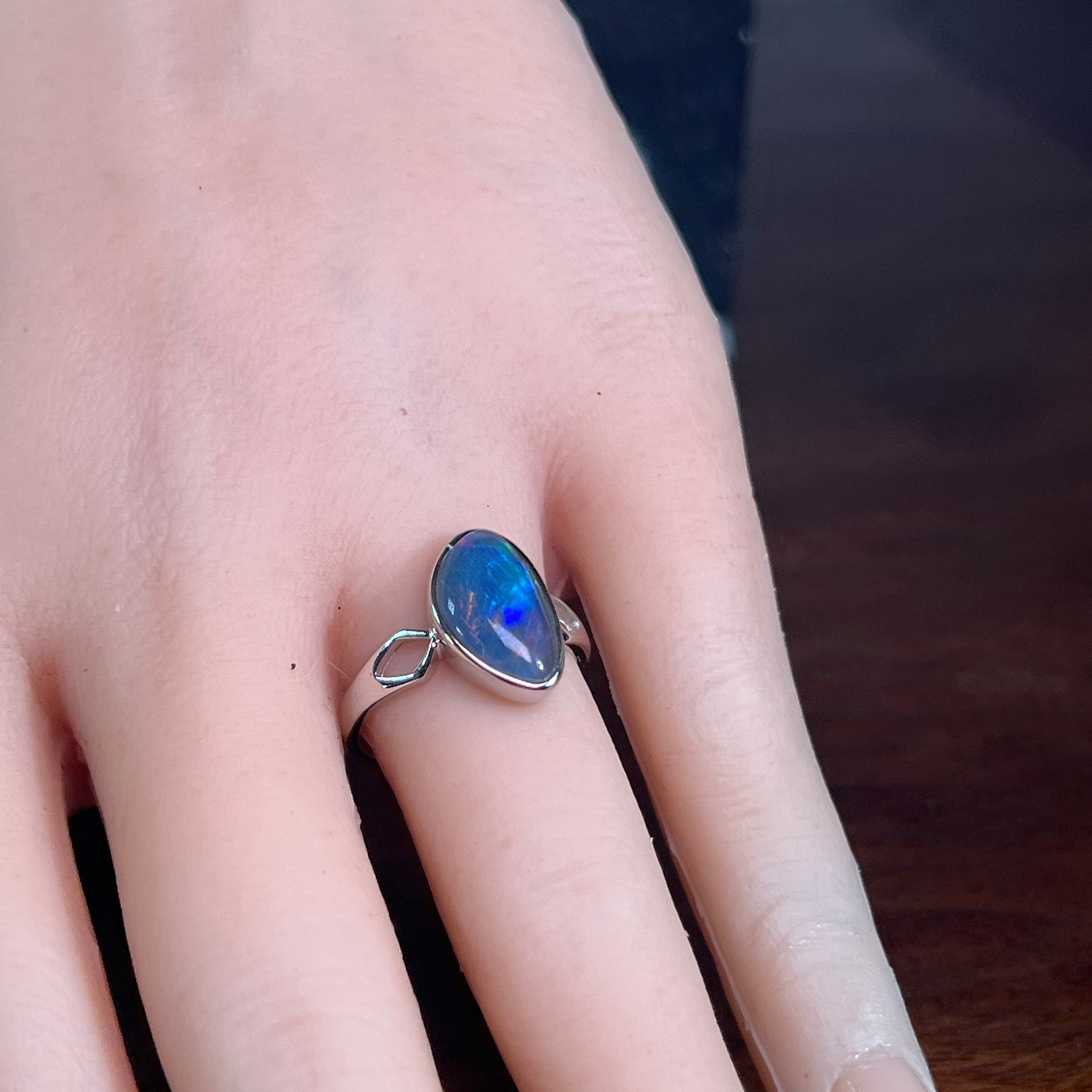 Australian opal triplet ring in sterling silver worn, triangular stone, size US 6.5