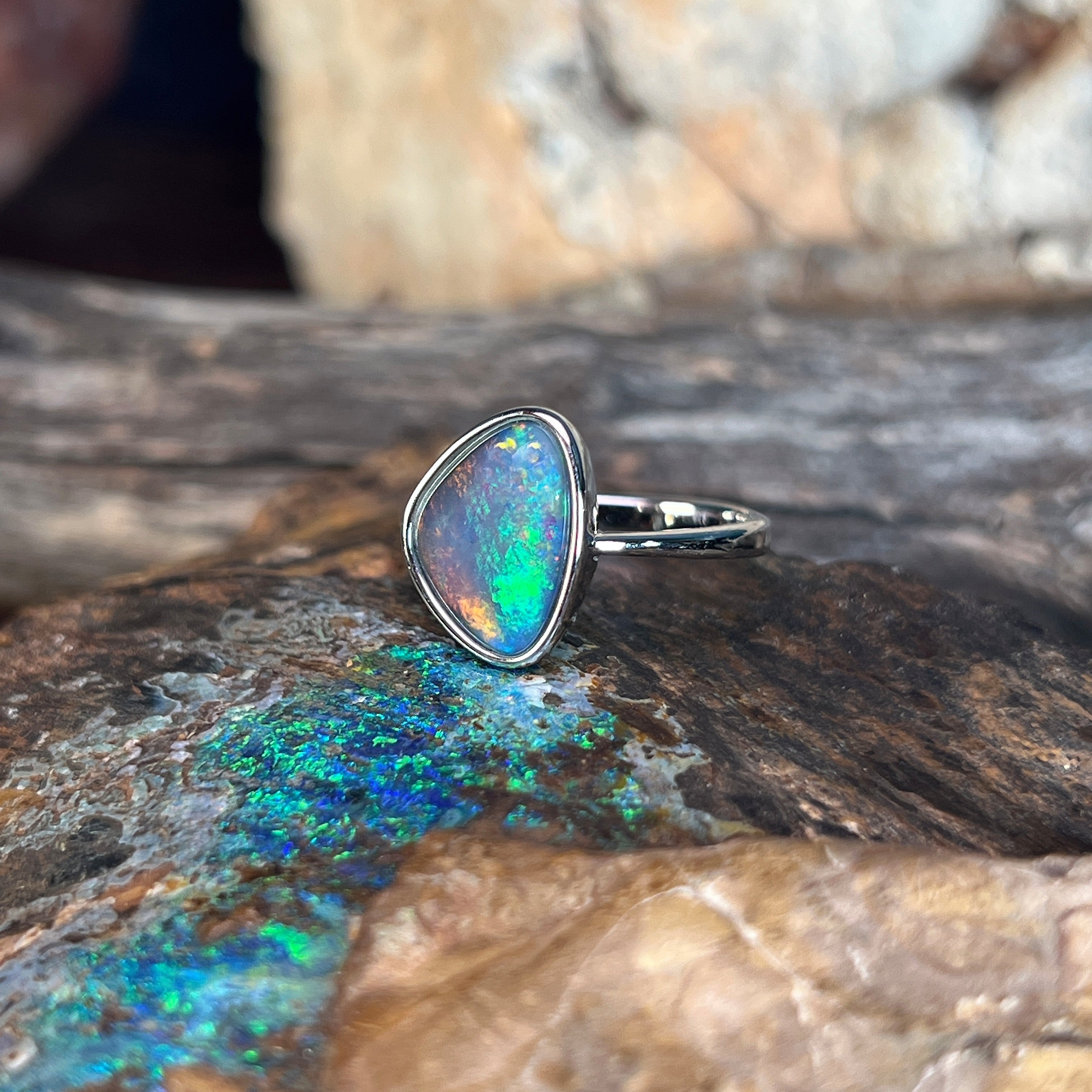 12.5 x 9.5mm Australian opal triplet ring in sterling silver, yellow, orange, blue and green