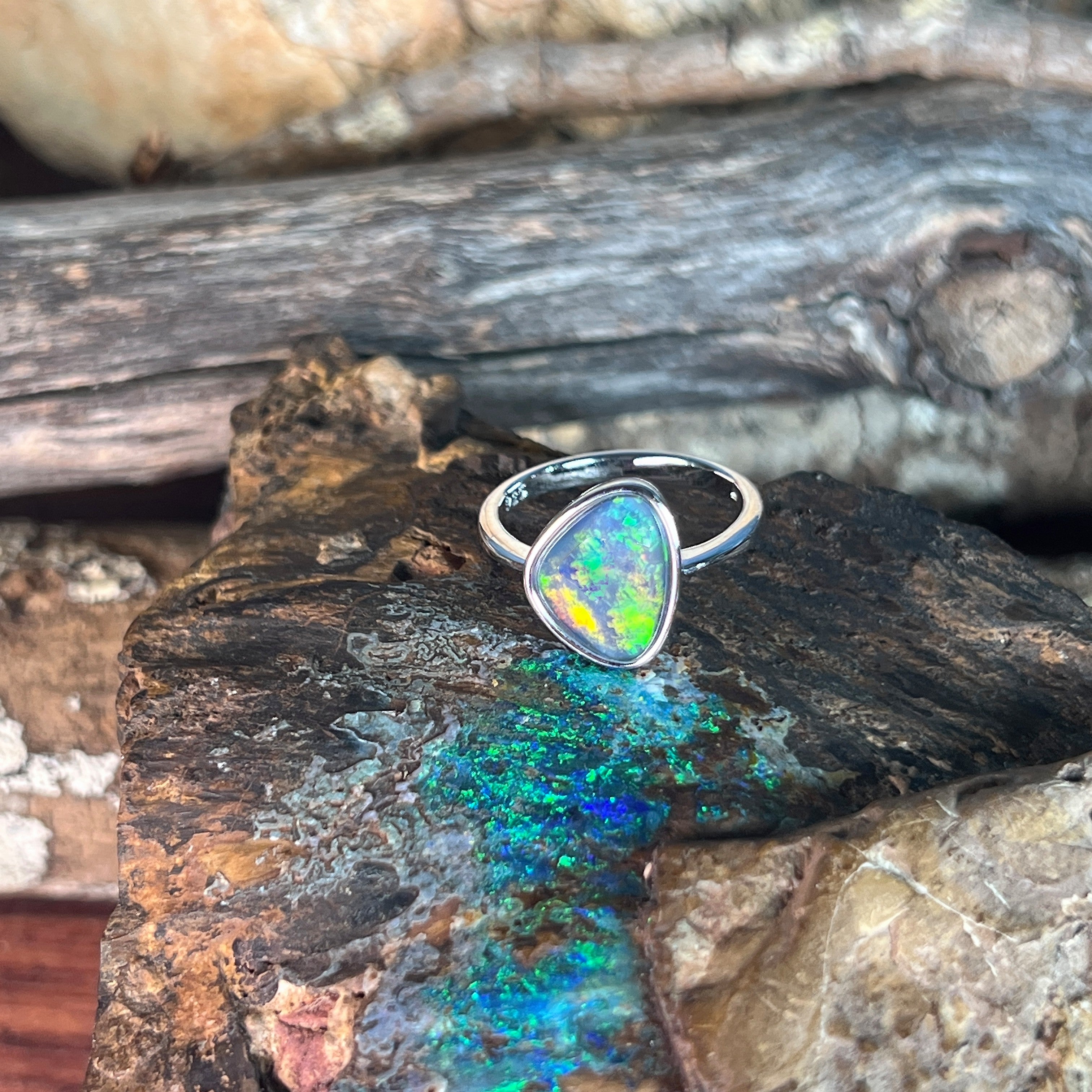 Australian opal triplet ring, sterling silver, 12.5 x 9.5mm stone showing yellow, orange, blue and green