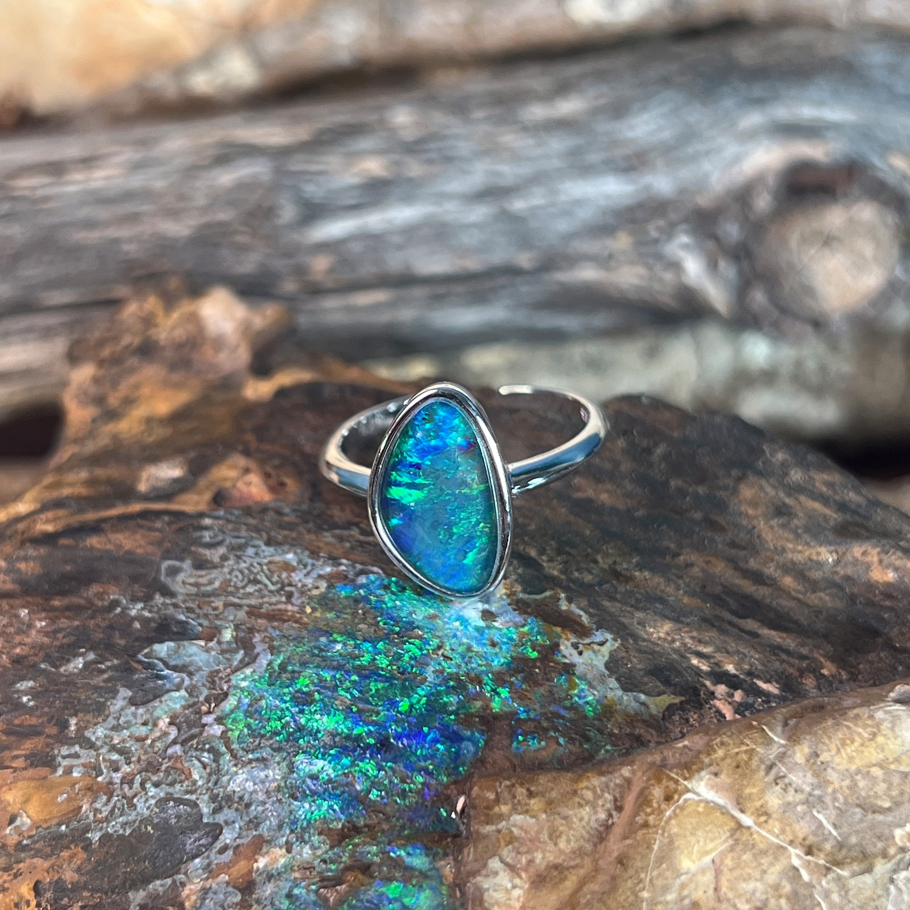 14 x 8.5mm Australian opal triplet ring in sterling silver, yellow, blue and green