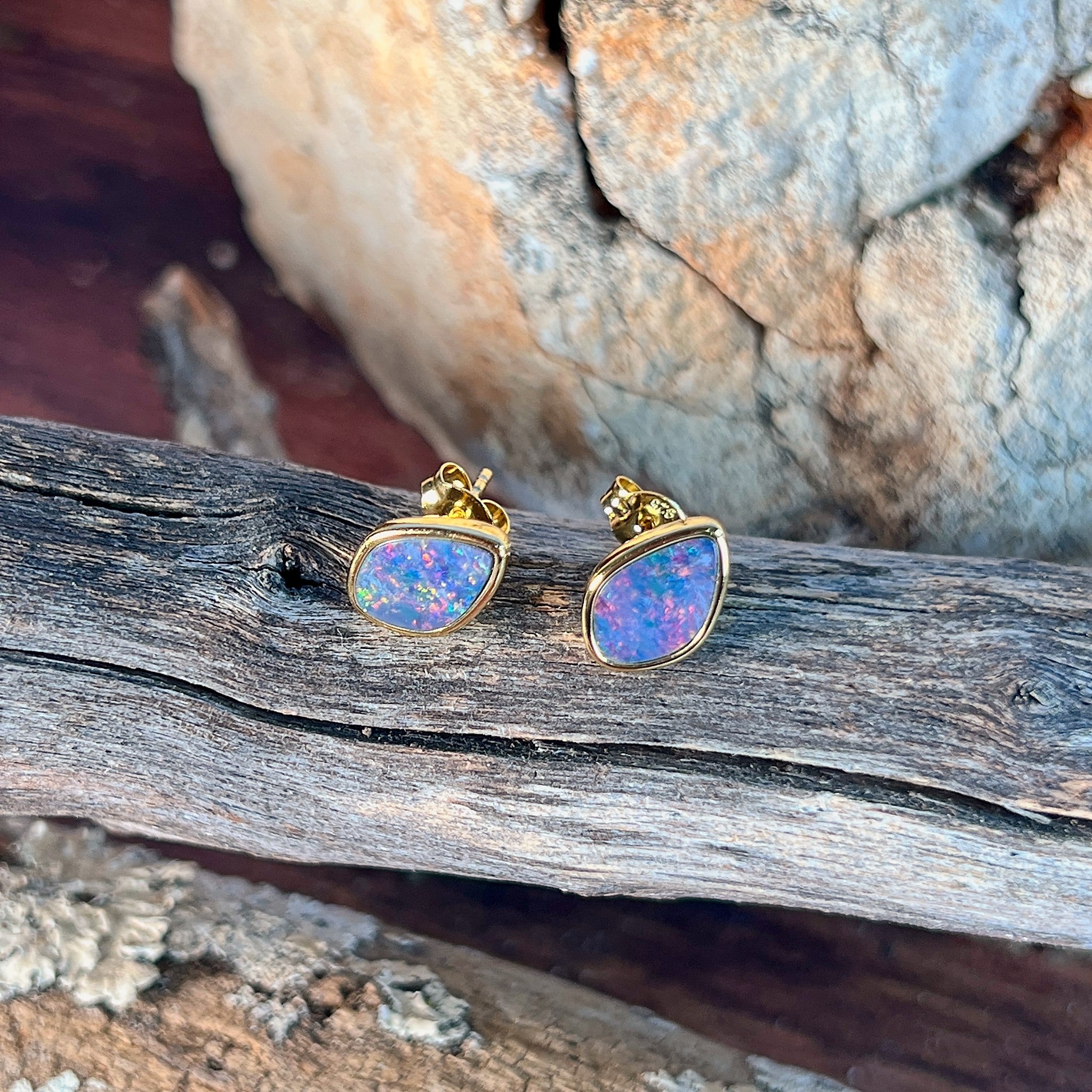 Australian opal doublet earrings, yellow gold-plated silver, freeform 11 x 7.5mm stones, red, blue and green