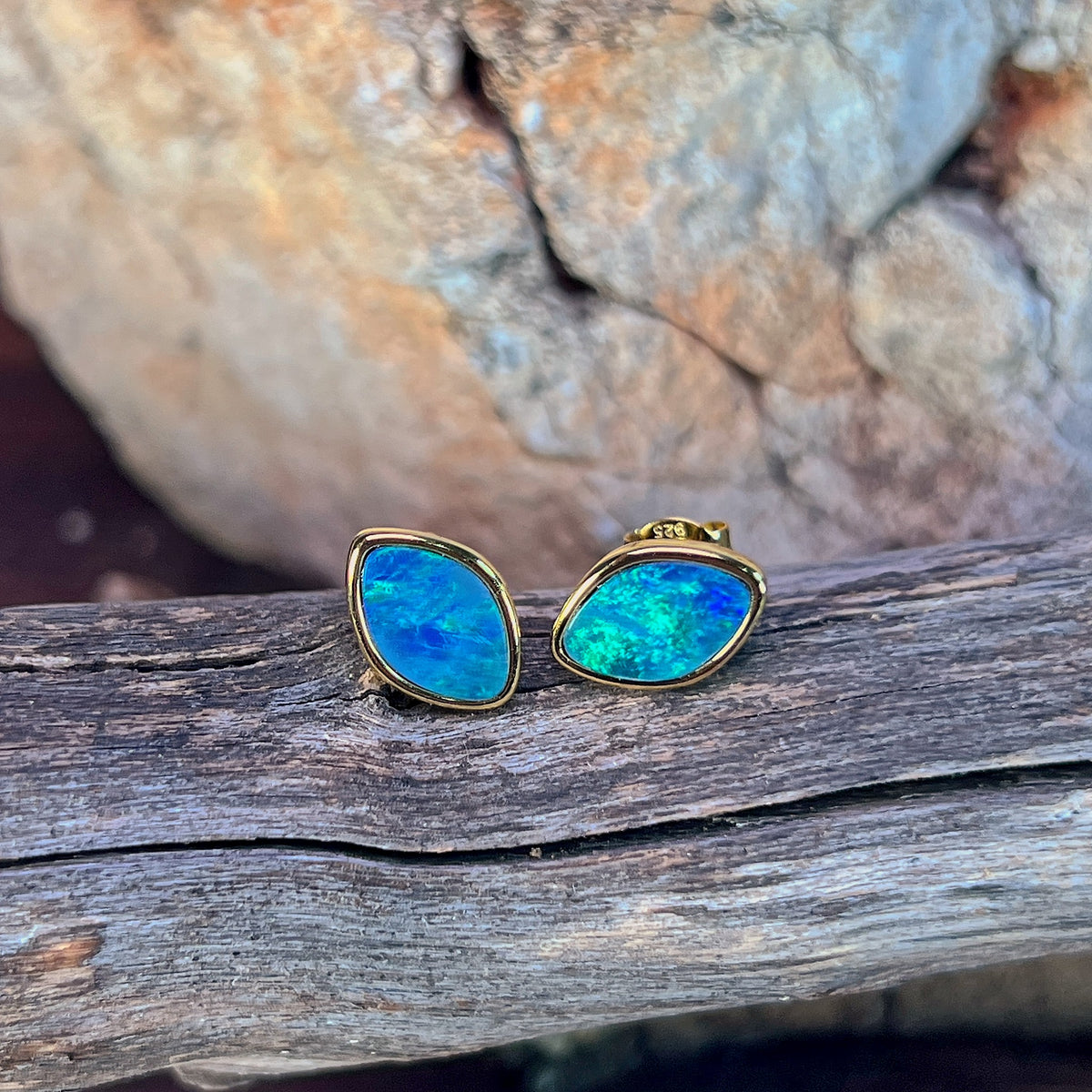 11.5 x 7.5mm Australian opal doublet earrings in yellow gold-plated silver, blue and green