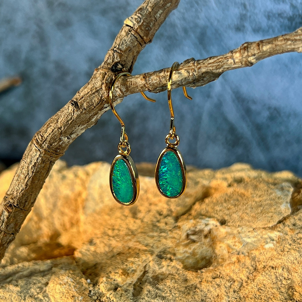 yellow gold-plated silver Australian opal doublet earrings with 11 x 6mm oval stones