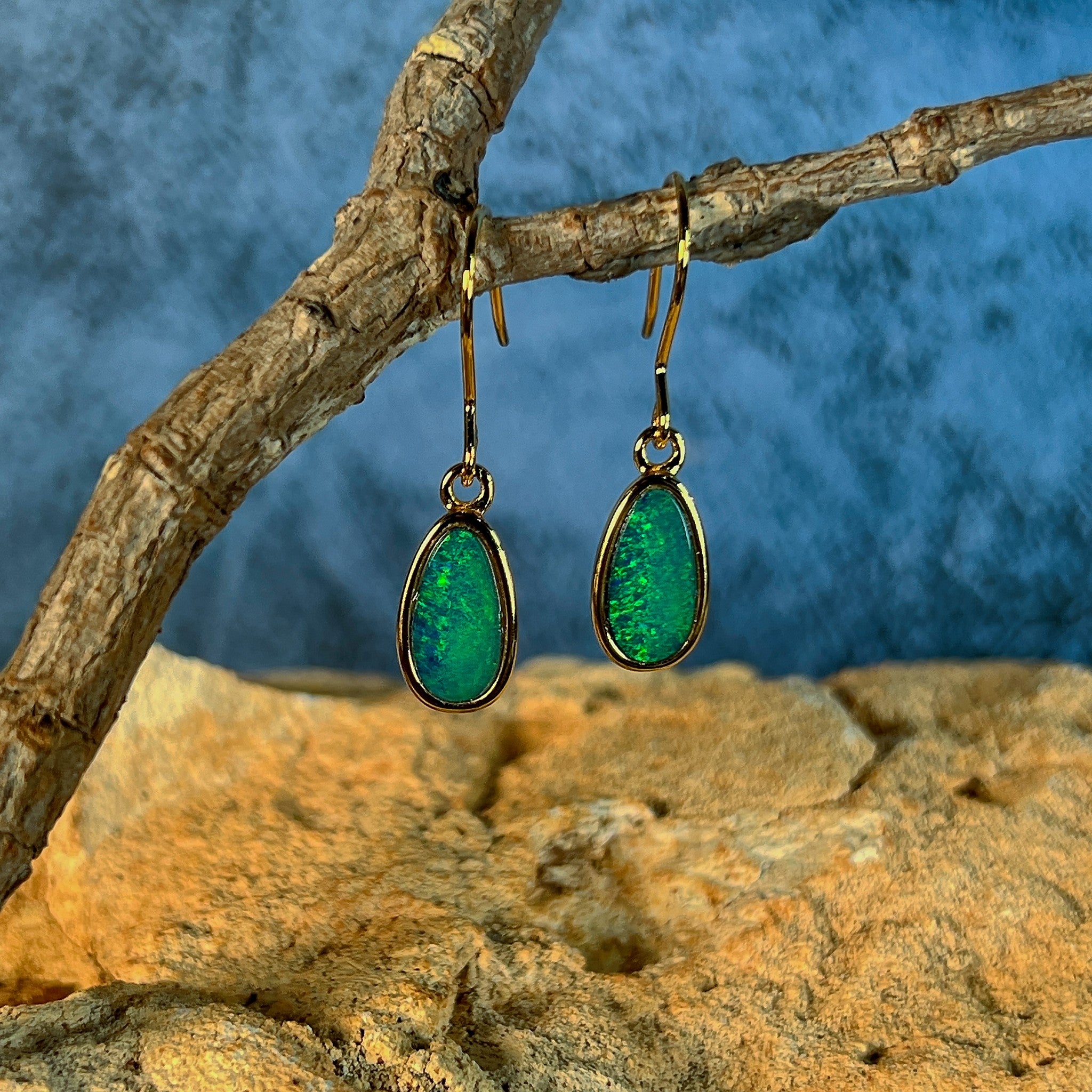 Australian opal doublet earrings, yellow gold-plated silver, 11 x 6mm stones showing green and yellow