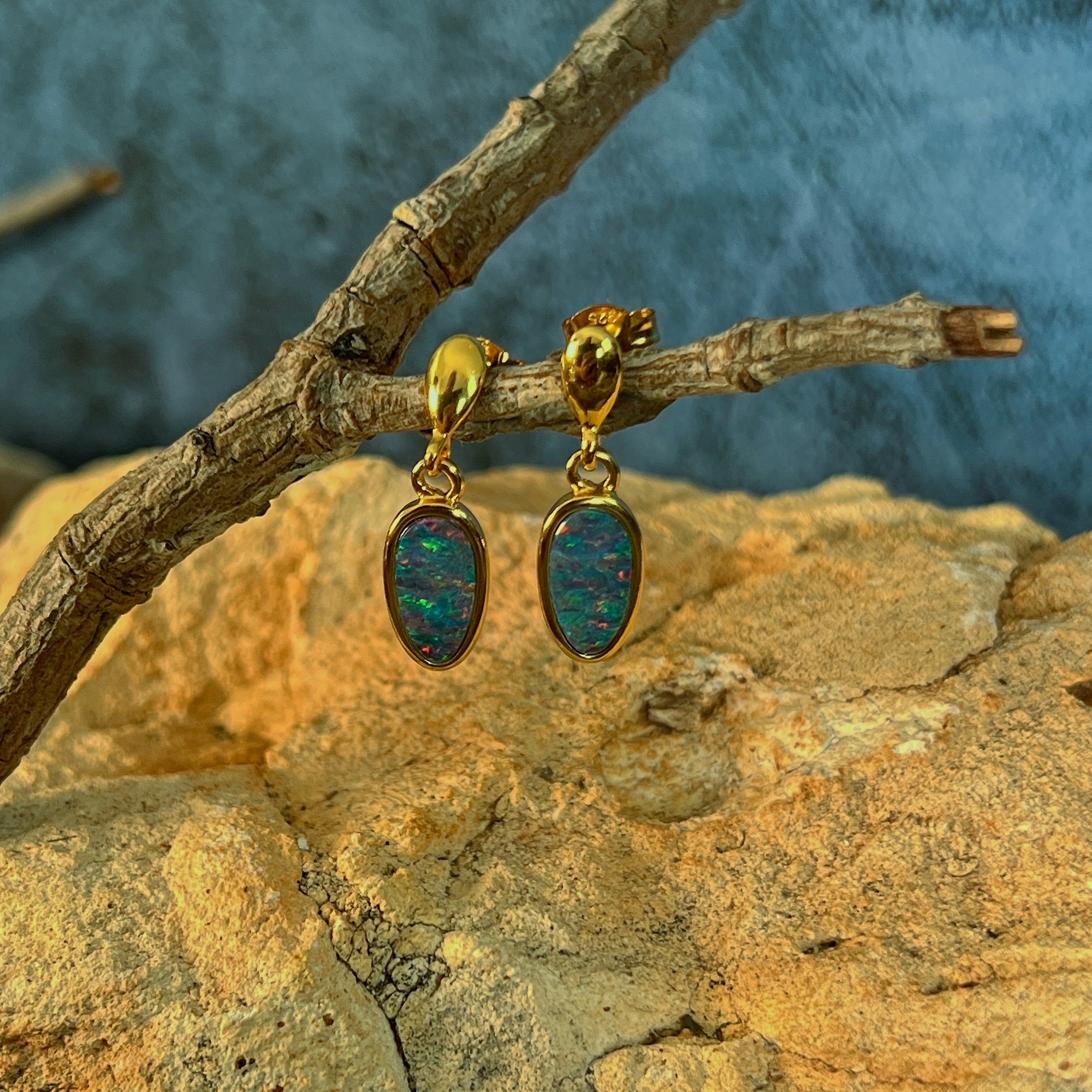red, pink, blue and green play-of-colour in 11 x 6mm pear-shaped Australian opal doublet earrings