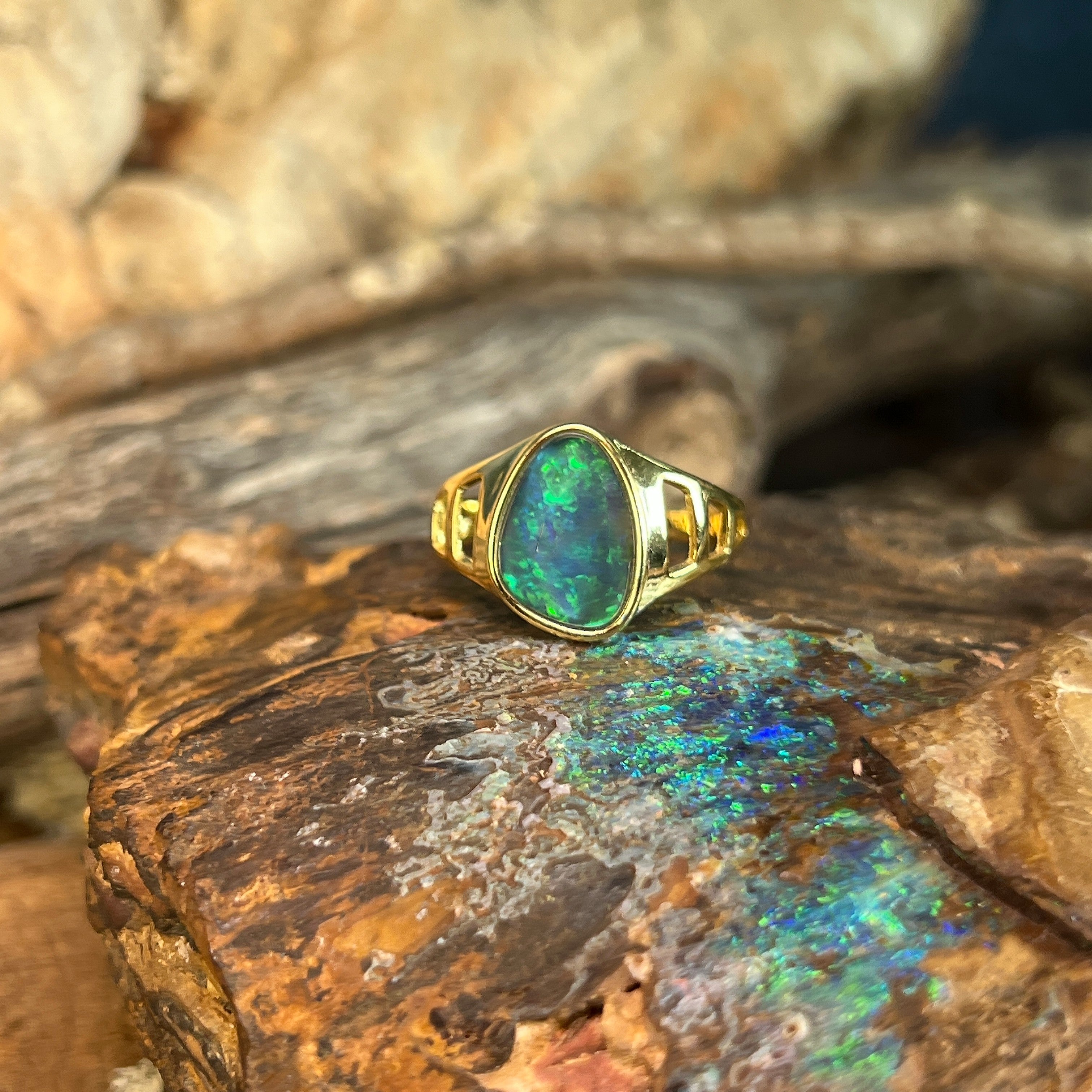 blue and green play-of-colour in a 12 x 9mm freeform Australian opal triplet ring