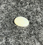 Natural Australian white opal, 4.89ct oval cabochon 16x12mm, with soft pastel play-of-colour